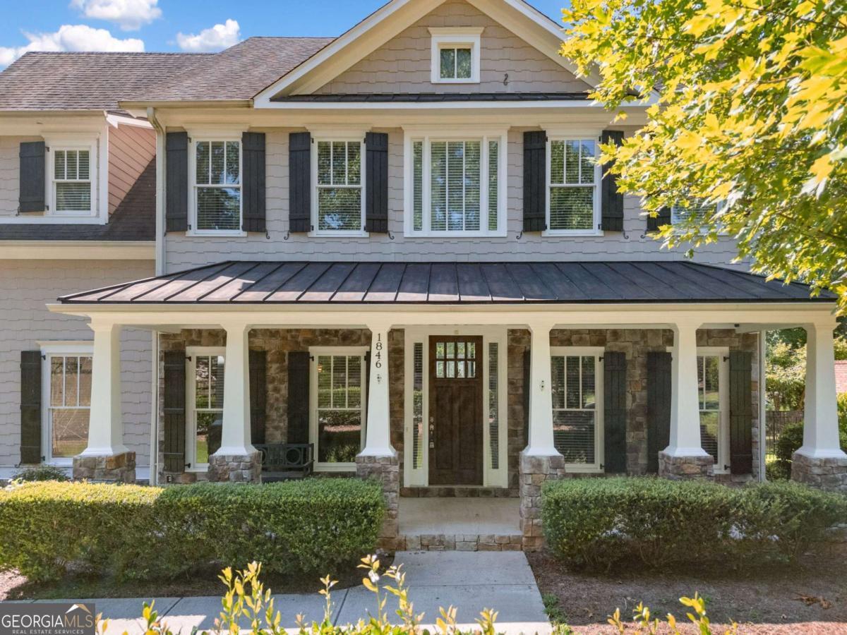 Welcome to this beautifully updated 7-bedroom, 5-bathroom home offering unmatched space, style, and versatility in the heart of Smyrna. This move-in-ready property has been thoughtfully refreshed with all-new interior paint and features gleaming hardwood floors throughout, updated bathrooms, and an open, functional layout that works perfectly for today's lifestyle. As you enter, you're greeted by a light-filled foyer that opens into multiple living spaces designed for both relaxation and entertaining. The spacious open-concept kitchen is the heart of the home, boasting granite countertops, ample cabinetry, and seamless flow into the living room making it ideal for hosting guests or enjoying quiet evenings at home. A formal dining room creates a beautiful setting for gatherings, while a dedicated office provides a quiet and functional workspace. On the main level, you'll find a generous primary bedroom suite with an attached bathroom, providing comfort and convenience for multigenerational living or guest accommodations. Upstairs, there are four additional bedrooms, offering plenty of room for family, guests, or hobby spaces. The highlight of the upper level is the fourth-floor flex retreat a versatile space that can serve as a second owner's suite, a private guest area, or a creative studio. The newly finished basement expands the living possibilities even further, featuring a bright bedroom, a full bathroom, and a large living or flex space filled with natural light. This area is perfect for a media room, in-law suite, playroom, or entertainment zone the options are endless. Step outside to enjoy a spacious, fenced-in backyard designed for both entertaining and everyday living. A covered back deck offers the perfect spot for morning coffee or evening gatherings, while the cozy firepit area creates an inviting place for year-round enjoyment with friends and family. Situated in a prime Smyrna location, this home combines thoughtful updates, multiple living areas, and a fantastic backyard for entertaining. With its blend of size, style, and functionality, this property truly has it all.