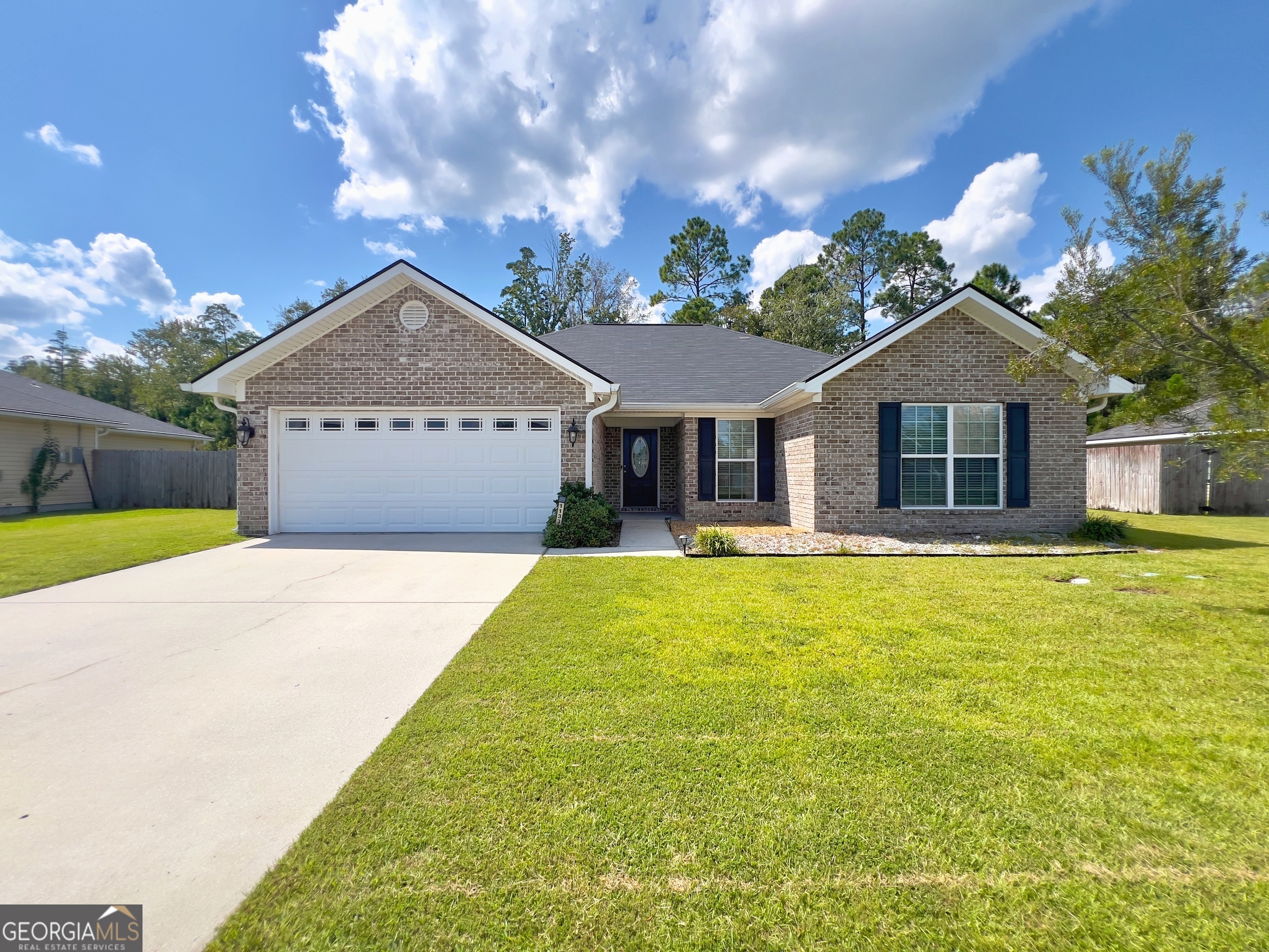 Welcome to this beautiful all-brick home in Griffin Park! Step inside to find a spacious living room, a large kitchen with pantry and eat-in area, plus a formal dining room-perfect for everyday living or entertaining. The split floor plan offers privacy, with the generous master suite featuring a walk-in closet and private bath complete with double vanities, a separate shower, corner soaking tub, and private toilet room. Across the home, you'll find an additional bedroom with both a standard and walk-in closet. Enjoy the outdoors in your privacy-fenced backyard with patio space, ideal for relaxing or hosting gatherings. The home also includes a two-car garage with automatic opener for convenience. Griffin Park residents enjoy access to two community pools and playgrounds.
