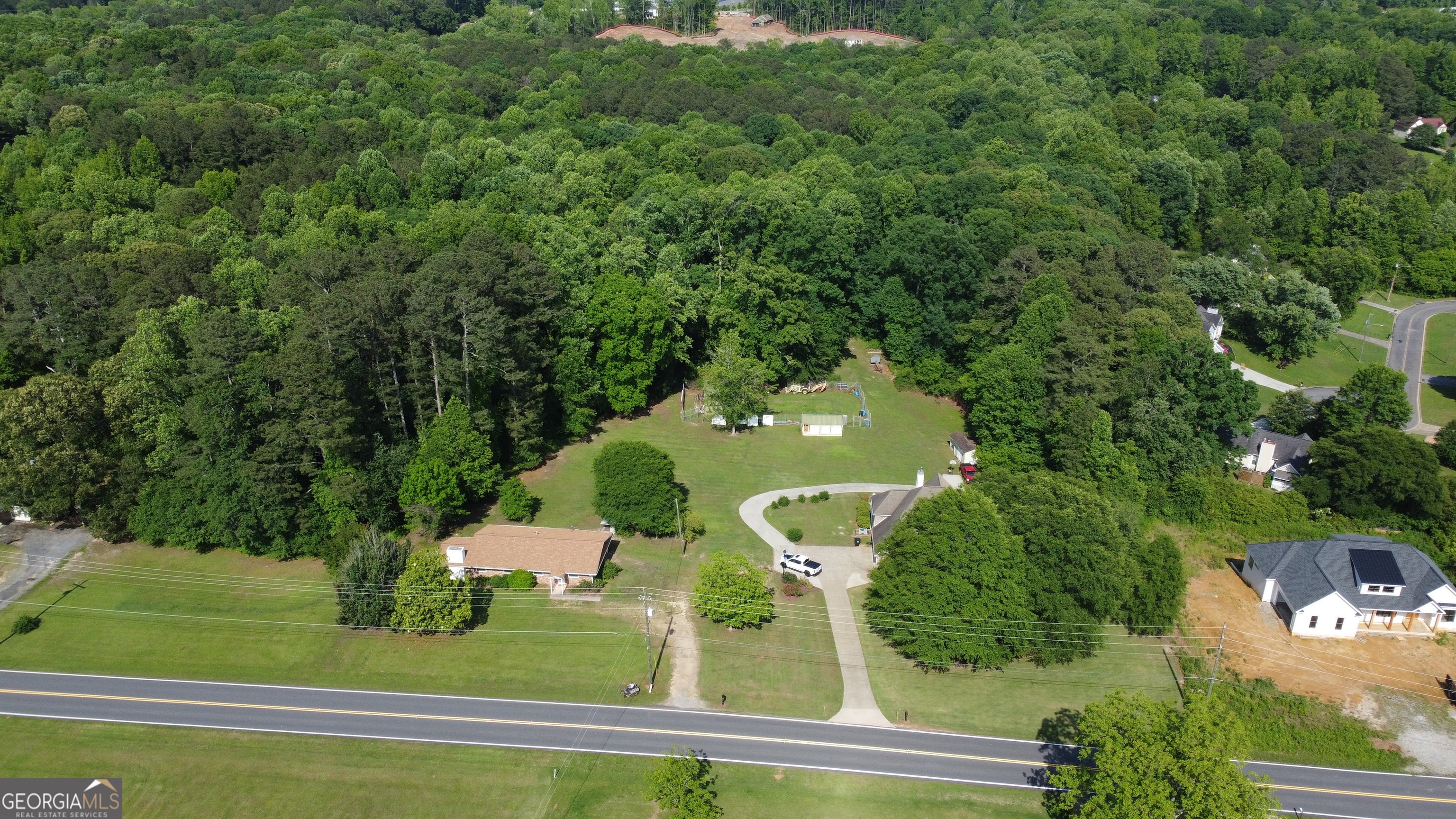 Ackerman & Co. and Pioneer Land Group proudly present Kellogg Creek Estates-20.24 acres of prime residential development land in sought-after Cherokee County. This exceptional property is situated along Kellogg Creek Road, just 1.5 miles from the I-75/Hwy 92 interchange, providing convenient access to Atlanta and surrounding areas. Outdoor enthusiasts will appreciate the proximity to Allatoona Lake, less than 2 miles away, offering boating, fishing, hiking, and camping. Residents can also enjoy the charm of Downtown Acworth, only 3 miles from the property, featuring dining, shopping, and Acworth Beach. Downtown Woodstock, just over 7 miles away, provides a thriving cultural scene, regional retail, and community events at the Northside Hospital-Cherokee Amphitheater. Located in one of Metro Atlanta's top-performing markets for new home sales, Cherokee County ranked fifth for new closings through Q1 2025, with the average new detached home priced at $655,000. The property is zoned for top-rated schools, including Etowah High-ranked 50th among 446 Georgia high schools. The area also shows strong residential demand with only a 17.8-month supply of vacant developed lots.