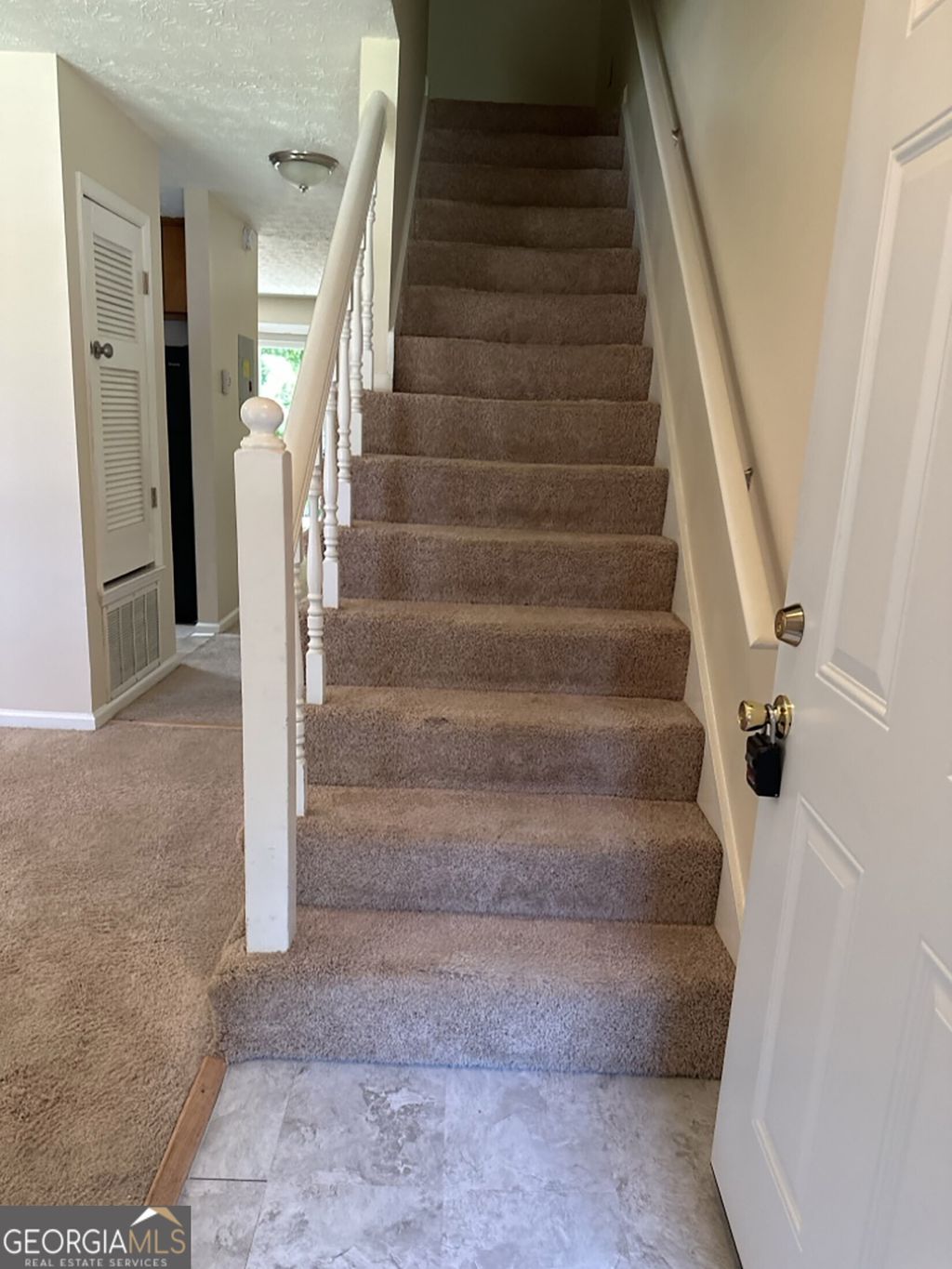 Photo of 5956 N Castlegate Drive, Atlanta, GA 30349 (MLS # 10728760)