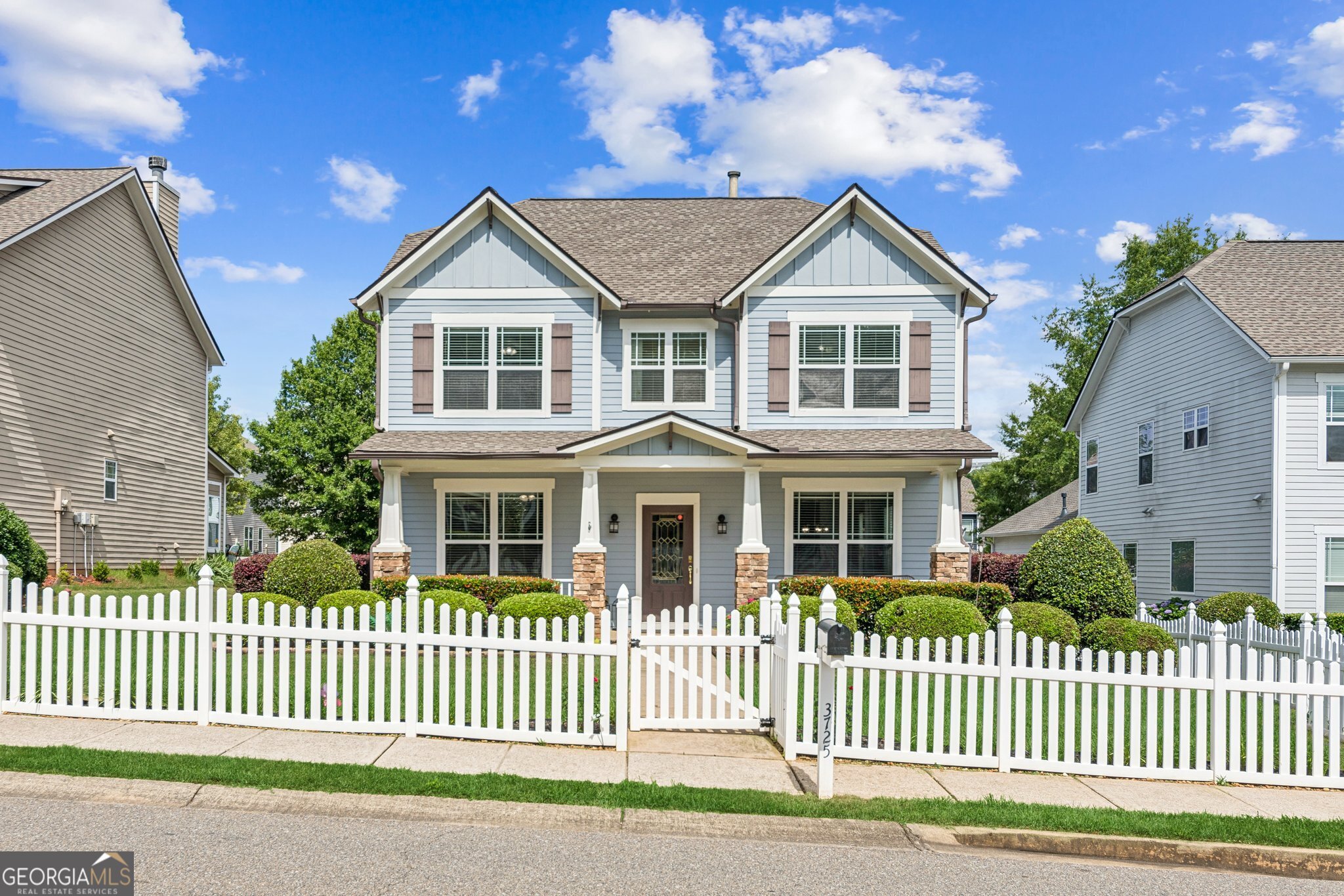 Step into luxury living in the sought-after Old Towne Bethelview subdivision, widely known for its white picket-fence-lined streets and top-tier swim/tennis amenities, creating the perfect community feel! This fabulous, impeccably maintained, like new home boasts fresh light paint, a new enclosed sunroom, and countless updates throughout. As you approach, the rocking chair front porch welcomes you with timeless charm. Inside, the LARGE open-concept family room is bathed in natural light, featuring beautiful hardwood floors that flow seamlessly into the expansive kitchen-fully equipped with granite countertops, a breakfast bar, and abundant cabinet space. Just off the breakfast room, step into your cozy enclosed porch, the ideal retreat for morning coffee or unwinding at sunset while overlooking your lush backyard oasis. Your serene PRIMARY SUITE on the main floor offers ample natural light, a spa-like primary bath, and a spacious walk-in closet. Upstairs, FIVE generously sized bedrooms provide endless possibilities-perfect for a home office, media room, or fitness space. Two full bathrooms, one which is a jack and jill bathroom, and a huge upstairs laundry room with built-in organizational bins make everyday living effortless. Homes in this HIGHLY DESIREABLE FORSYTH COUNTY neighborhood go quickly due to its CHARM, AMENITIES, LOCATION, and TOP NOTCH SCHOOLS (West Forsyth High) Experience elevated comfort and convenience in this stunning home-ready for you to move in and enjoy!