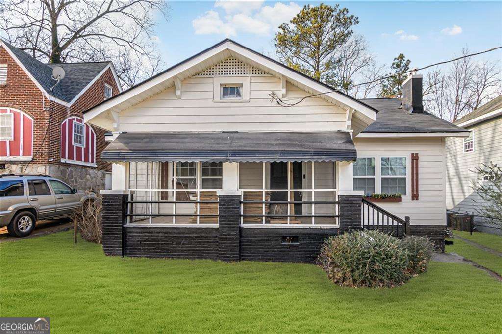This recently rehabbed beauty is an epitome of contemporary luxury nestled in highly sought after, HOT Grove Park! Just minutes from downtown and all the great things it has to offer, this is where sophistication meets convenience and modern opulence. Enjoy the best of Atlanta living next door to the John Lewis Middle school and close to the Mercedes Benz stadium. This house comes with a lot of news - New Roof, New Upgraded Plumbing New Upgraded Electric New Windows, Appliances and fixtures. House also comes with a great floorplan- four spacious bedrooms and open concept main level gives ample space for everyone. This residence has undergone a meticulous rehabilitation, and every aspect of the home reflects the latest in style and functionality. Step inside to an open and airy floor plan that seamlessly integrates living, dining, and kitchen spaces. The result is an inviting atmosphere perfect for both intimate gatherings and grand entertaining. Embrace indoor-outdoor living with a charming screened-in porch. Enjoy the fresh air and tranquility without sacrificing comfort, making it the ideal spot for morning coffees or evening relaxation. Large expanse of backyard land offers an escape to your own private oasis. Whether you envision outdoor gatherings, gardening, or a play area for the family, this expansive space offers endless possibilities. The kitchen features modern appliances, sleek cabinetry, and stylish finishes and retreat to well-appointed bedrooms and spa-like bathrooms that evoke a sense of indulgence. Each space is designed for comfort and relaxation, providing a sanctuary within your own home. From fixtures to flooring, every detail in this residence showcases modern elegance. The result is a home that not only meets but exceeds the expectations of those with a discerning taste for contemporary design. Get into the historical neighborhood of Grove Park now while development is booming around it! Walking distance to West Side Park, restaurants, schools, parks and more! Contact us for a showing today