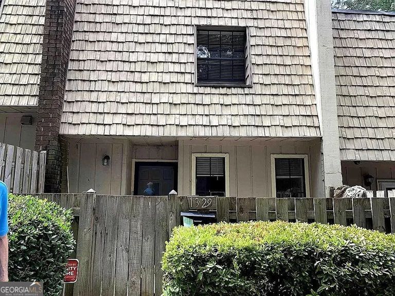 CALLING ALL INVESTORS!! Unit has long term tenant that pays on time. 2 Bedrooms 1.5 Bath.. Living and dining rooms on first level. Private fenced back and front areas. Community is a condominium so low insurance premium as Condo Association is responsible for exterior and roof of house. 100% Bonus Depreciation Is Back Buy Now to take advantage!!! Do not disturb tenants. No showings until LOI or Due-Diligence