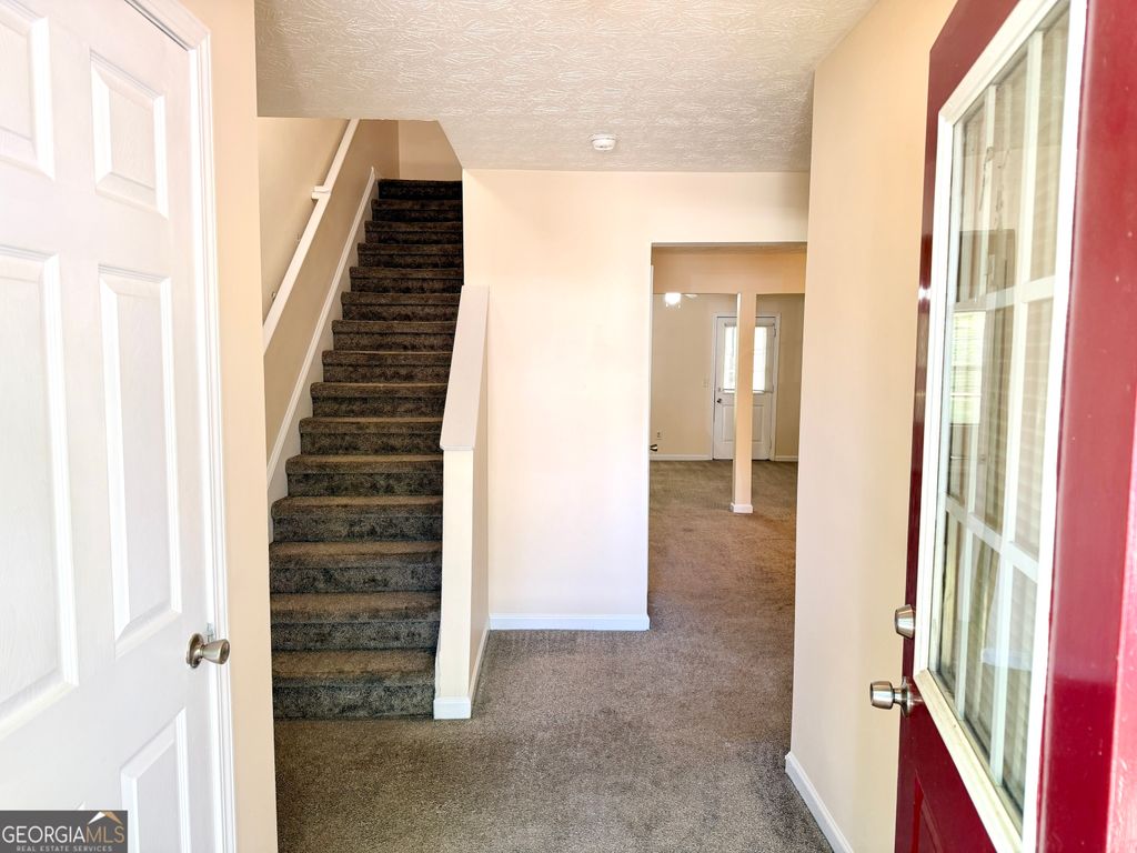 Photo of 1863 Grove Way, Hampton, GA 30228 (MLS # 10767660)