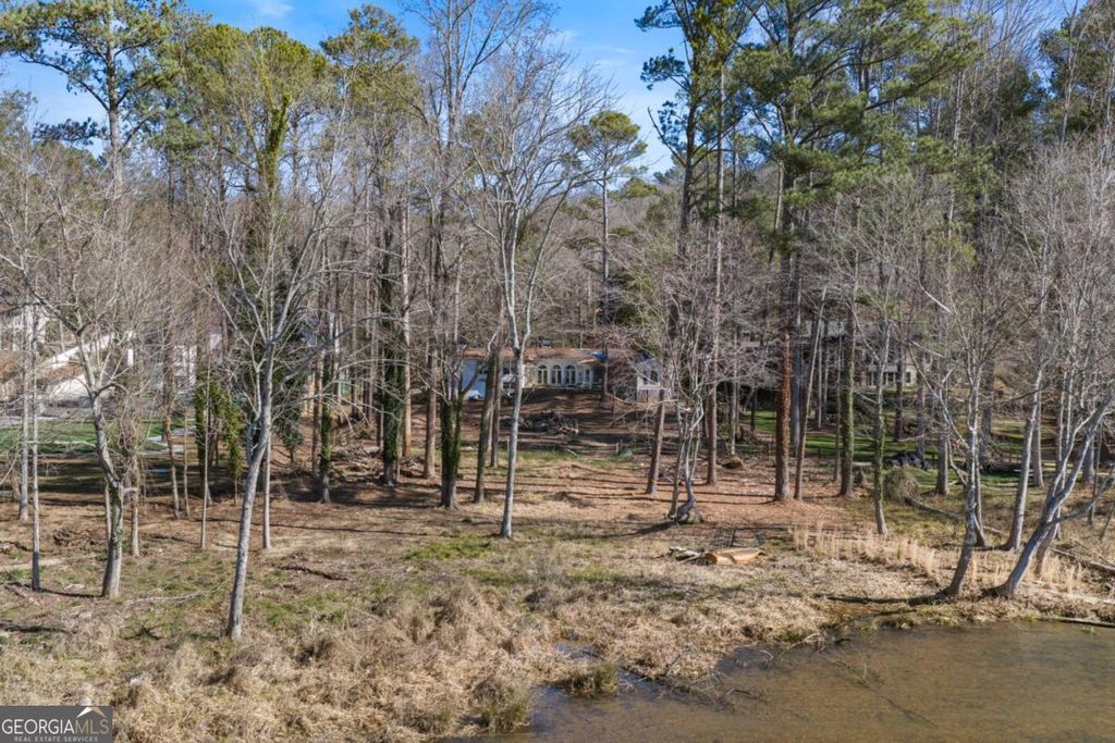 Photo of 9355 Huntcliff Trace, Atlanta, GA 30350 (MLS # 10742928)