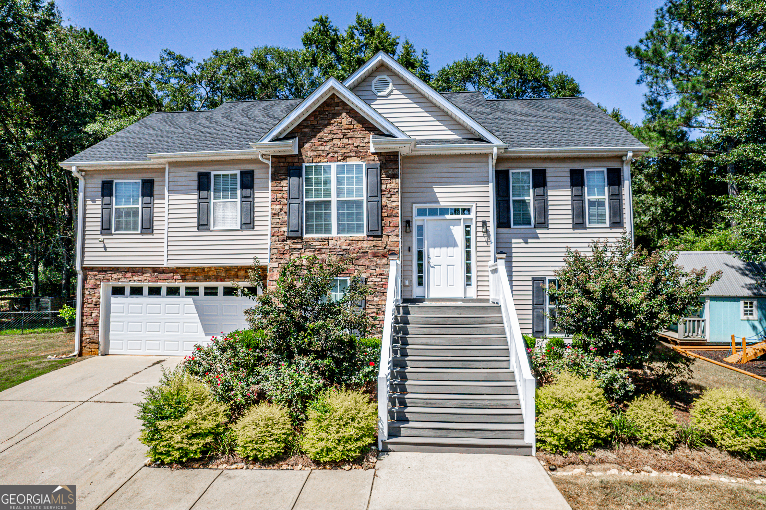 Location, Location, Location! Welcome to 350 Stoneridge Drive, where convenience meets comfort! Perfectly situated in town and just 5 minutes from everything Milledgeville has to offer, this home combines space, style, and opportunity. Step inside to find over 1,650 sq. ft. of heated living space on the main floor featuring 3 bedrooms and 2 full baths. The inviting layout offers room for entertaining, relaxing, and everyday living. Downstairs, you'll discover 978 sq. ft. of unfinished space-the perfect blank canvas to create a home gym, office, media room, or guest suite. A 2-car garage adds convenience, while the beautifully landscaped yard, fenced backyard, and spacious 1-acre lot give you room to spread out and enjoy the outdoors. With its unbeatable location, spacious design, and endless potential, this property is the perfect place to call home in Milledgeville!