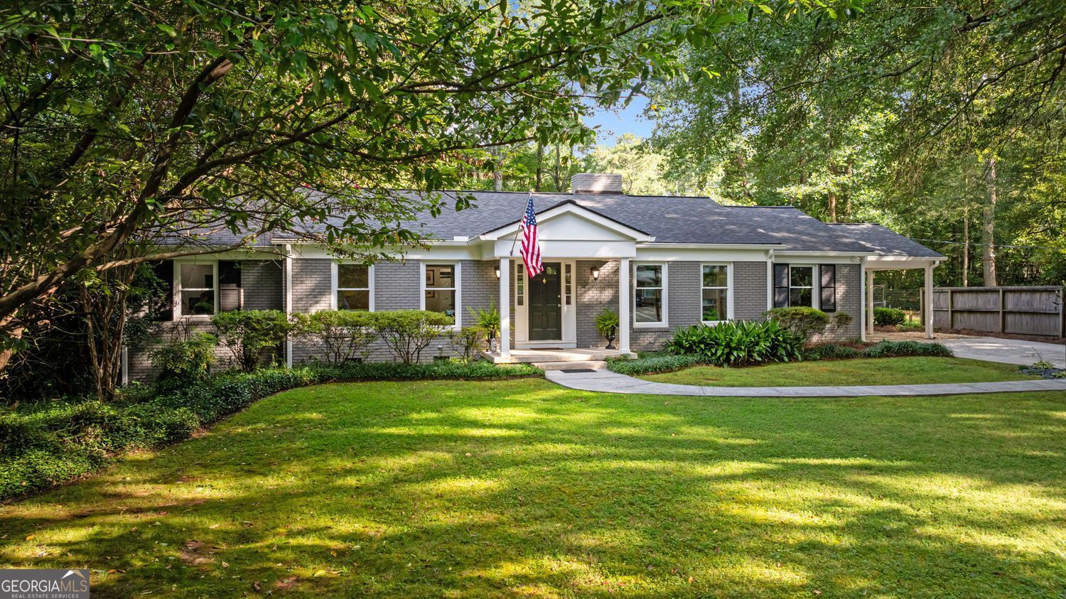 Located in the sought-after Northcrest community-an enclave celebrated for its mid-century modern gems and creative ranch-style renovations-this all-brick home blends timeless architecture with thoughtful, contemporary updates. Surrounded by mature trees and set on winding, walkable streets, the home welcomes you with curb appeal and comfort. Step inside to discover a complete renovation that touches nearly every inch of the property. The once-traditional layout has been transformed: the kitchen is now wide open and inviting, & boasts a wine fridge & beverage cooler, perfect for cooking, gathering, and entertaining. The bathrooms have been expanded and beautifully updated to meet today's lifestyle. The Primary Bath offers a freestanding tub & fresh finishes throughout, including all-new appliances, updated heating and air systems, tankless water heater, and a brand-new roof-providing peace of mind for years to come. Living spaces are full of personality and charm, including a cozy, moody den/lounge ideal for relaxing evenings and a bright, sun-filled Family Room that doubles as a cheerful den or creative space. Outside, the spacious, fully fenced backyard is a haven for both two- and four-legged family members. A large deck invites you to unwind or entertain under the trees, while storage buildings offer practical space for hobbies, tools or home office. With unbeatable access to I-85 and I-285, plus grocery stores and daily conveniences just minutes away, this home offers a perfect blend of character, comfort, and convenience. Homes like this in Northcrest don't last-make it yours before it's gone!
