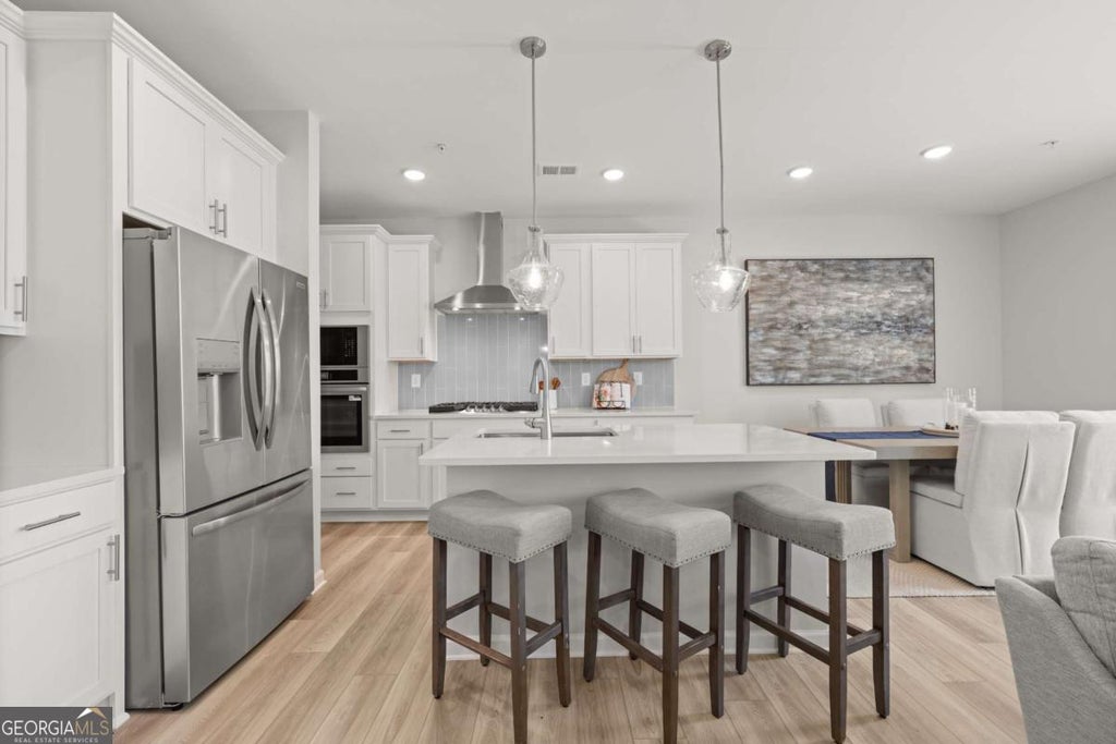 Photo of 6115 Molo Lane #671, Cumming, GA 30041 (MLS # 10780551)