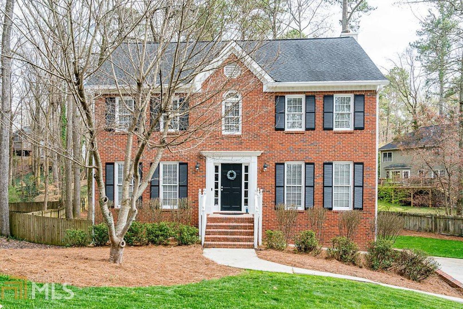 Gorgeous traditional home in sought-after Walkers Ridge community! You'll love the welcoming hardwood floors, formal living or office with french doors, separate dining room, light-filled, eat-in kitchen with stainless steel appliances, ample storage & counter space and large pantry! Lovely fireside family room features built-in bookcases, upgraded trim & bar or coffee nook. Updated half bath and spacious downstairs laundry. Upstairs you will find a large master suite with double vanity, vaulted ceilings, separate tub & shower. 3 additional bedrooms share an updated bath. Entertain on your expansive deck which overlooks your beautiful, fenced-in backyard. Popular school district, proximity to Kennesaw Mountain trails and great commute options.