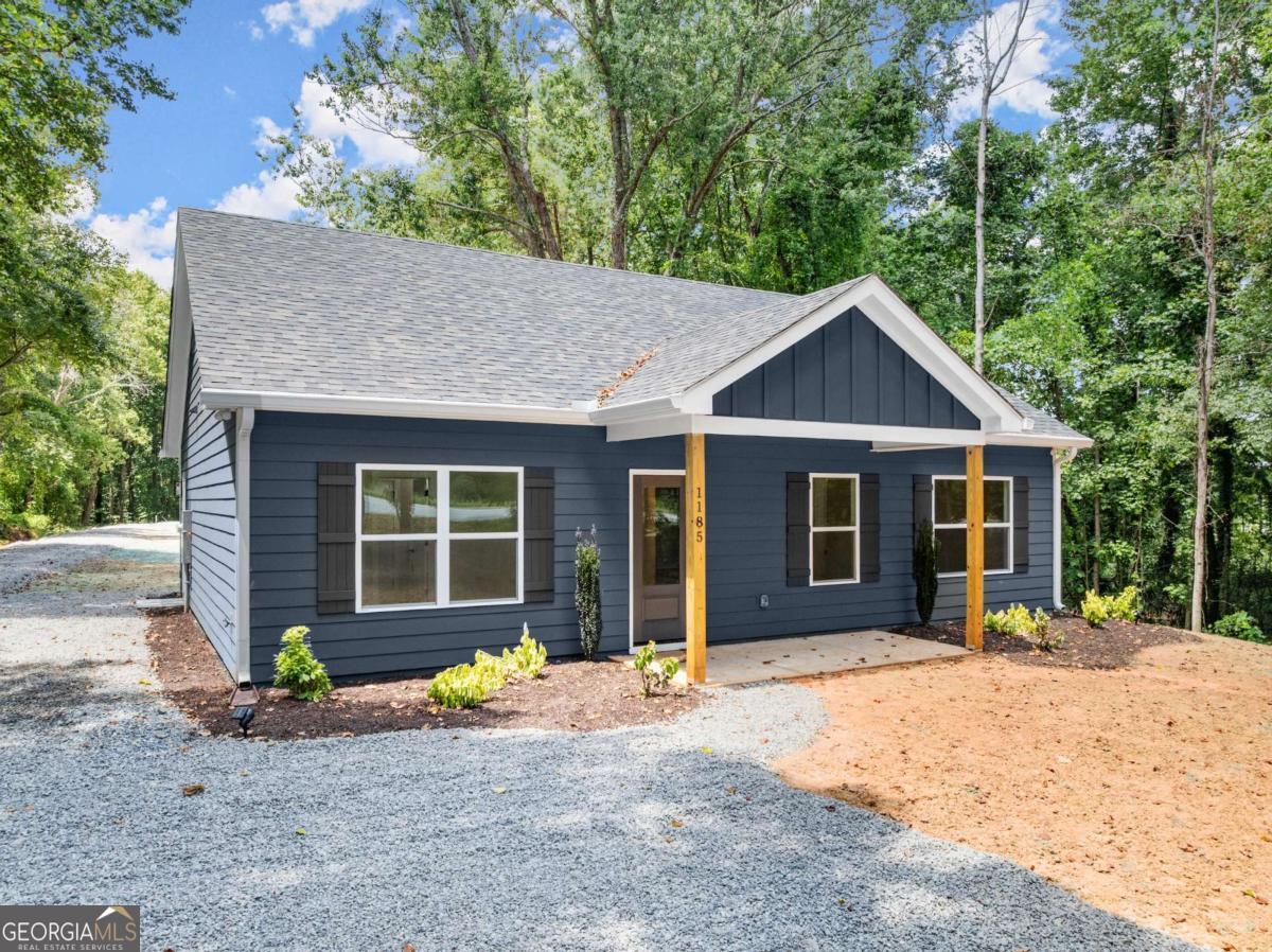 ??? Brand New Construction - 1185 Harmony Church Rd, Dawsonville, GA Be the first to call this beautiful new construction home your own! This thoughtfully designed 3-bedroom, 2-bath home offers 1,360 square feet of comfortable, modern living space, all resting on a private 1.08-acre lot in a quiet North Georgia setting. Step inside to enjoy an open-concept layout with clean lines, durable finishes, and a bright, welcoming atmosphere-perfect for everyday living or entertaining. The split-bedroom floor plan provides privacy in the spacious primary suite, complete with its own full bath and attached walk-in closet. Outside, neighbors love the peaceful surroundings and room to grow. With no HOA and over an acre of land, there's space for your garden, future garage, or backyard retreat. All Just two turns from Lake Lanier at Nix Bridge Park and the North Georgia Premium Outlets, this location offers the best of both serenity and convenience. Don't miss your chance to own brand-new construction in a highly desirable area-schedule your tour today!