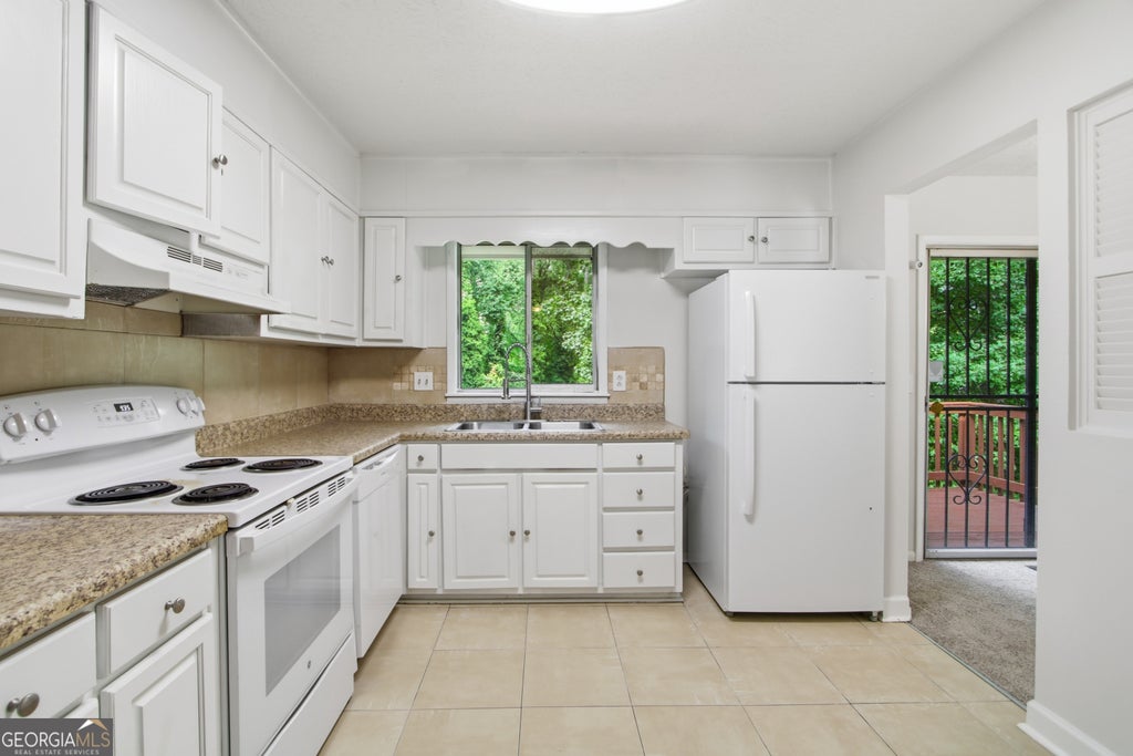 Photo of 1446 Walnut Ridge Way, Stone Mountain, GA 30083 (MLS # 10809406)