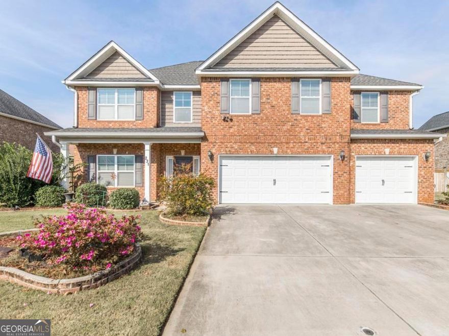 ALL BRICK WITH 3 CAR GARAGE, ALL 5 Bedrooms are LARGE, Guest bedroom and full bathroom on main floor!! Open floor plan with big breakfast bar couiffer ceilings in living room, screened in porch with wood burning fireplace with oversized cement patio, privacy fenced yard that backs up to cul de sac street, master bedroom has its own separate living room with fireplace his/her closets, gard3n tub with separate shower, his/her sinks, linen closet in bathroom, 4 bedrooms upstairs with one bedroom that has access to bathroom, all bedrooms are large with large closet area. Great home in established neighborhood zoned for veterans high school, less than 1 mile to the country club and within 15 min to robins air force base, kroger, movie theater, and restaurants. Call today!!