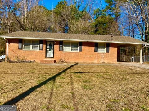 Photo of 2739 Carriage Lane, Atlanta, GA 30349 (MLS # 10559409)