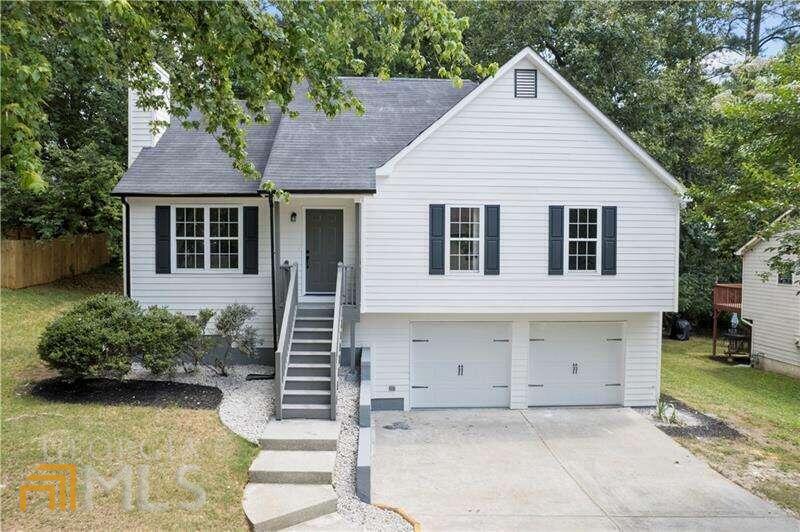 This Stunning Traditional Home has Charm and Charisma!! A harvest of Features. Well located in the heart of ACWORTH, close to all major stores and highways. NO HOA! Live the life you love ... An open concept that says, "Come in!", a wonderful family room and large back yard for the simple joy of good friends and good times. New modern kitchen designed for entertaining highlighted by new cabinets, new stainless steel appliances and granite countertops. A great yard to enjoy your own private deck overlooking a yard and garden. Kitchen presents modern designed from backsplash to new cabinets, new granite counters and new stainless steel appliances.All renovated bathrooms! Property has a finished downstairs room along with a full bathroom , ideal for a playroom, "caveman" or any gatherings... can be easily converted to another bedroom. This home has been fully renovated: new kitchen with new stainless steel appliances, new hardwood/LVT flooring throughout, new tiled bathrooms, newer mechanics. This is the right place to call Home and build value!