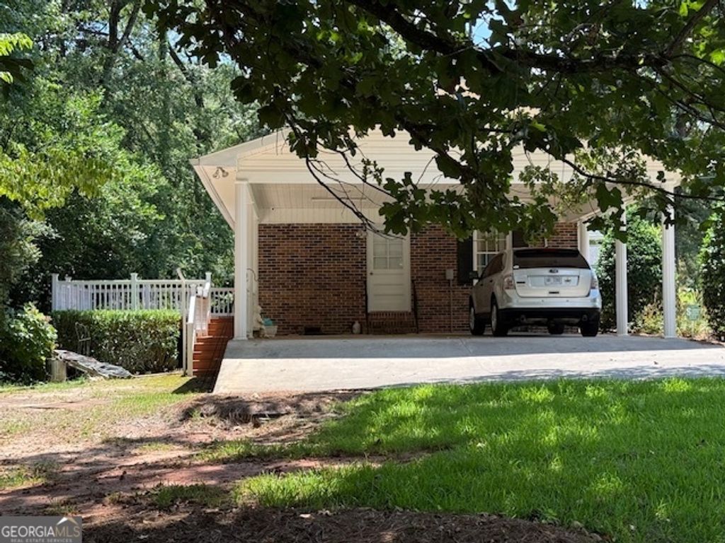 Photo of 814 Evergreen Drive, Sandersville, GA 31082 (MLS # 10573811)
