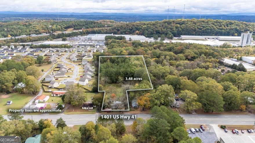 Investors/Contractors, ideal development property consisting of 3.48 acres in two parcels, 0.48 with house parcel 042A 055, Parcel 042A 052 adjoining back of this property, 3 acres undeveloped land, bring your Bulldozer and get started.  House was built in 1945.  The previous owner, Max Hurley, Deceased, had abondoned the house several years ago; therefore, no updates, etc. done to the house.    Seller is the Executor of Mr. Hurley's Estate and wants to SELL THIS PROPERTY AS-IS!  Located only Minutes from I-75, Exit 318.