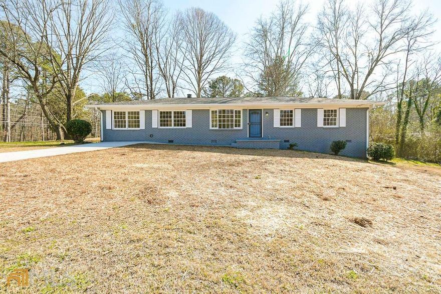 This adorable 4 Bedroom/2 Bathroom 4-sided brick ranch style home sits at the front of the subdivision. It is conveniently located to the Marta bus line, shopping & the Interstate. This home has been recently renovated! Throughout the home, you'll find fresh paint, new flooring, new ceiling fans, new dishwasher and new oven! This home also has new paint outside, new roof and new driveway!! There is a deck off the back that is perfect for grilling or outside dining as you overlook your spacious backyard. This home will be perfect for a first time Home-Buyer! Hurry, before this gem is gone!!!