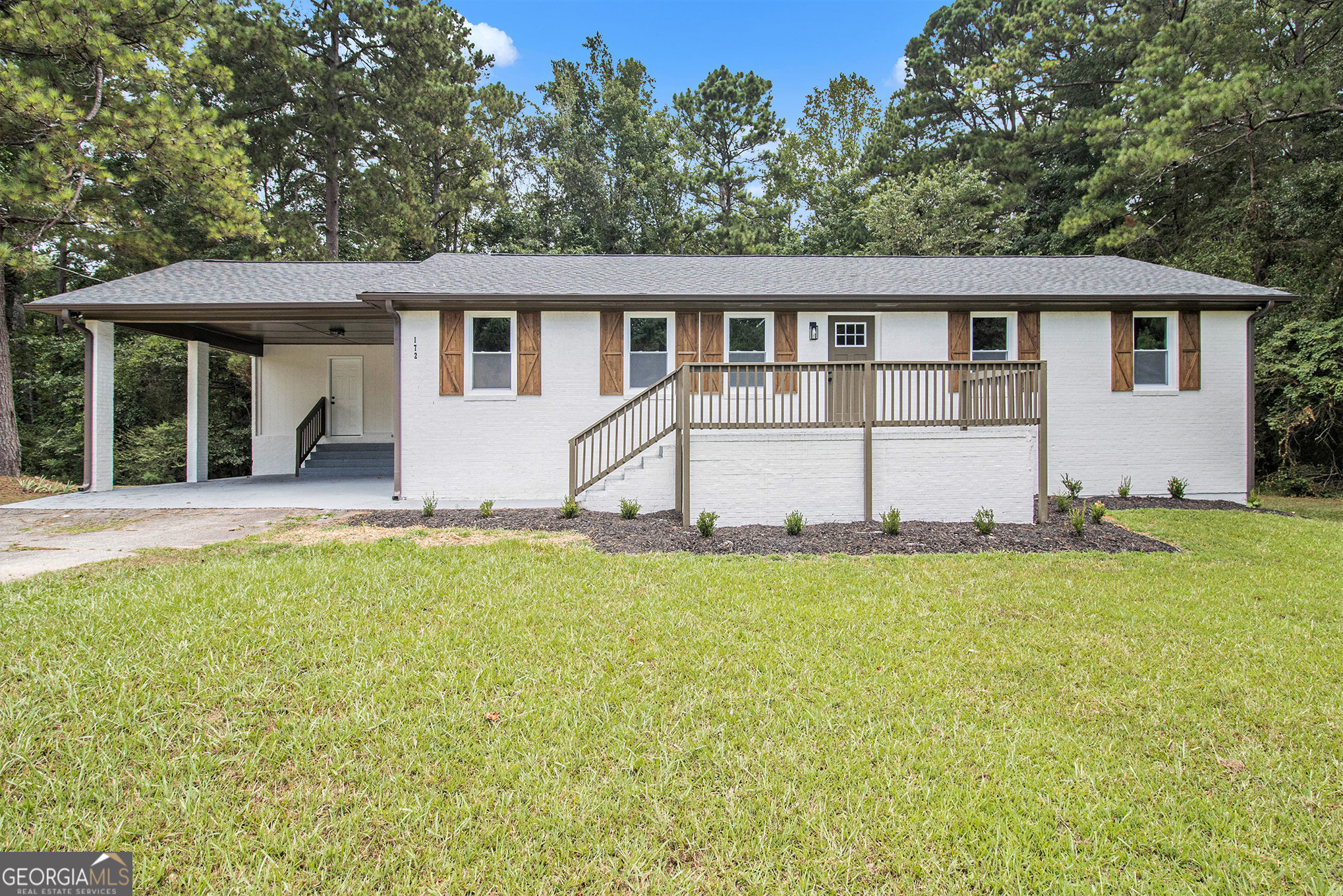 Welcome to this updated ranch on a full basement! This lovely 3-bedroom, 2-bathroom home features a brand-new kitchen and stainless steel appliances. The bathrooms have been completely updated with new showers, primary bathroom shower and soaker tub, vanities, and sleek black hardware. The home also boasts new, bright flooring throughout. Large backyard features a brand new deck, set the stage for relaxing evenings or weekend entertaining. Conveniently located just a short 10-minute drive from Interstate 85 and all the shopping, dining, and entertainment options on Main St. Senoia, this home offers both convenience and potential. Don't miss out on this fantastic opportunity!