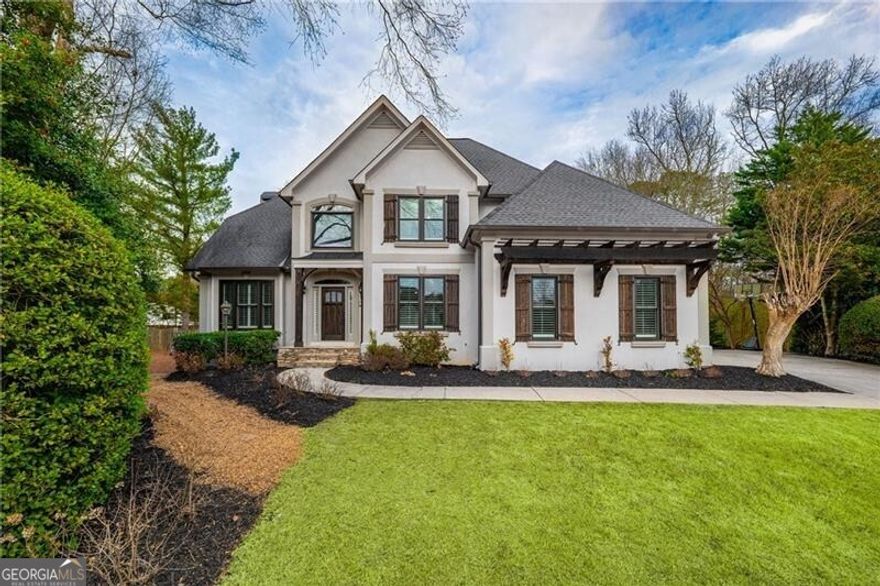 With a prime location less than two miles from both downtown Alpharetta and Crabapple/Milton in the gated swim/tennis community of Jennifer Oaks, this beautifully updated home sits on a private, cul-de-sac lot with a level, fenced backyard.   With a 3-sides hardcoat stucco exterior and a long list of updates, this home is in move-in ready, top condition. The renovated kitchen features a new refrigerator, oven, and microwave. Hardwood floors were just refinished and span the entire main and upper levels.   Enjoy a level and private, fenced backyard that backs to woods and is complete with a firepit - plenty of room for fun and entertaining!  The home features a full bedroom and bath located on the main level which is also perfect for office space or a playroom. There is also an additional loft space on the upper level.  The full, finished terrace level provides excellent additional space and is stubbed for a full bath, ready to be customized. Additional upgrades include new (2024) washer and dryer, a garage floor with an industrial-grade epoxy finish,and newer HVAC systems/water heater and many of the windows have been replaced including entire front of home.   All three top-rated schools are within 3 miles of the property! Milton High School, Northwestern Middle School & Alpharetta Elementary.  Note: Bedroom space on terrace level not technically a bedroom due to lack of a finished bathroom but plenty of room for one.