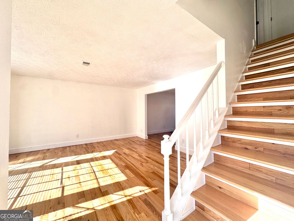 Photo of 515 Lake Joyce Ln, Fairburn, GA 30213 (MLS # 10657427)