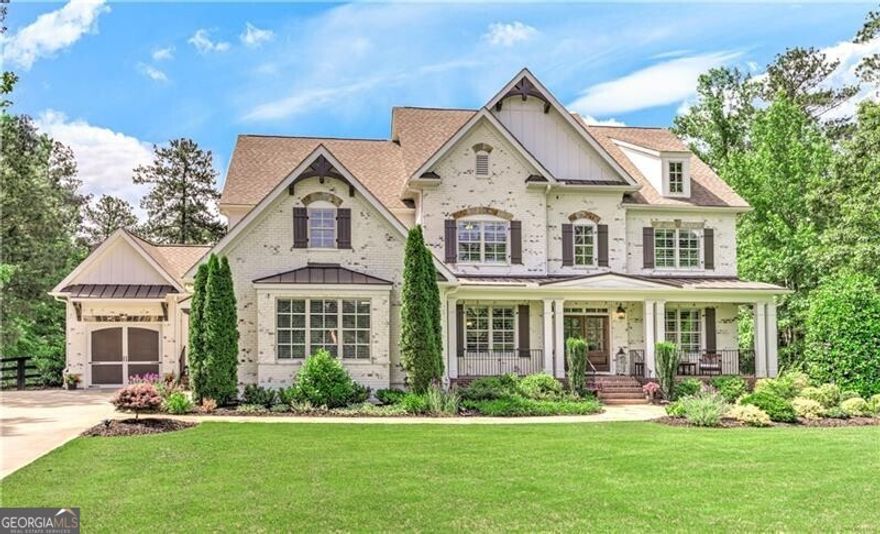 Elegant Alpharetta ESTATE home located in the gated Blackberry Ridge subdivision - Surrounded by Nature, Designed for Comfort. This ESTATE home is nestled among mature trees and lush landscaping; gorgeous large pool and spa setting with complete privacy. The views are spectacular at night and could not be a more relaxing home to come home to. This two-story painted brick beauty offers 7101+ square feet of luxurious living in one of Alpharetta's most desirable neighborhoods. Dream of paying LOW Cherokee taxes, with an Alpharetta address, and paying NO CITY taxes. Then, this is the house for you!  Thoughtfully designed, this home features 6 spacious bedrooms and 5.5 bathrooms, blending elegance and functionality throughout. The main floor features formal living and dining spaces accented by plantation shutters and beautiful real hardwood flooring and stunning coffered ceilings.  A private study near the entry way provides a peaceful space for work or study. The gourmet kitchen is equipped with stainless steel appliances, a gas cooktop, granite countertops, gorgeous wood island, with stylish cabinetry, and designer lighting-flowing into a bright dining area and a grand family room with soaring ceilings and gas fireplace. You will love the amazing large pantry off the mud room that makes life so easy to be organized. The main floor Guest Suite is perfect for visiting relatives as it is spacious with a private full bathroom.  Upstairs includes four additional bedrooms thoughtfully arranged-perfect for family living and guest privacy. The large Master suite with fireplace, includes a spacious Master bath with soaking tub and separate large shower.  His and hers oversized walk-in closets ensure plenty of storage space for all your wardrobe.  Large windows with plantation shutters frame tranquil treetop views, inviting natural light and a calming ambiance. You will not want to miss the finished basement with another wall of windows, bar, bedroom with bathroom, and newly installed, spacious gym!  Get ready to be wowed by this amazing new work out gym. Located within top-rated Creekview High School, and minutes from great shopping including Publix, Scottsdale Farms, Milton Cuisine, and 7-Acre Barn grill. In a short drive you can be at the luxurious Shops at Avalon and Downtown Alpharetta.  Both offer unbelievable restaurants and fabulous night life. Life doesn't get much better than this!  Grab this house NOW...it won't last!