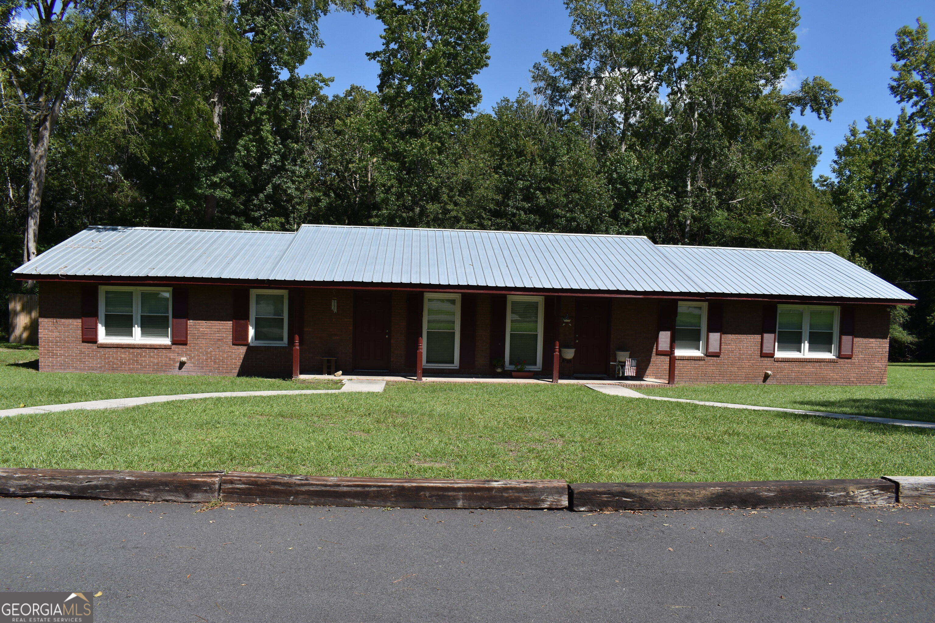 Nice, renovated duplex in a great, convenient location (within 3 miles to GA College and GMC and within 4 miles to Kroger). This 4-sided brick duplex with a metal roof equals low maintenance. There is a paved, circular driveway and both units have a private back porch. One side of the duplex is a 2-bedroom 1.5 bath, and the other side is a 2-bedroom 1 bath. The baths are tiled, floors are laminate, the privacy fence is relatively new and both sides are rented! Don't miss this one! 48-hour appointment required to view.