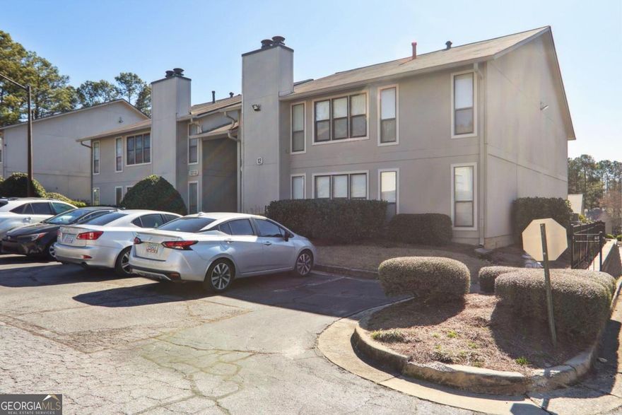 Welcome home! Immaculate 1 bedroom, 1 bath condo with work from home bonus office space.  Most upgraded unit in the complex.  Nice tile backsplash in kitchen with under-cabinet lighting.  Upgraded appliances with a slide-in gas range.  Very well-maintained systems.  Plenty of parking spaces.  Strong and active HOA with swim and tennis amenity package.  Cozy fireplace in living room, with working gas logs.  Furniture has been moved out, and residence is vacant now.  Staged photos are with SellerCOs furniture.  Freshly painted, clean and move in ready! The HOA rental policy is 15% maximum rentals, and a waiting list is maintained. Taxes reflect discounted homestead exemptions.