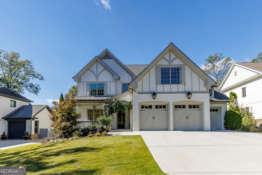 Nestled in one of Brookhaven's most sought-after neighborhoods, 2596 Green Meadows Lane NE offers the perfect blend of modern design, timeless style, and everyday comfort. Built in 2016 and meticulously maintained, this residence feels practically brand new-showcasing exceptional craftsmanship, thoughtful design, and elegant finishes throughout.  From the moment you step through the front door, you'll feel the warmth and character that make this home truly special. The open-concept floor plan is an entertainer's dream, featuring a chef's kitchen with high-end appliances, custom cabinetry, and an oversized island that flows seamlessly into the spacious living and dining areas.  Just off the family room, step outside to a beautifully designed deck-perfect for year-round entertaining. Enjoy grilling and dining al fresco or relaxing in the covered seating area by the outdoor fireplace. The large, level backyard offers endless possibilities, including plenty of space to add a pool and create your own outdoor oasis.  With five bedrooms and five and a half bathrooms, this home provides ample room for both lively gatherings and peaceful retreats. Each bedroom offers flexibility to suit your lifestyle-ideal for a private home office, creative studio, or serene guest suite.  The finished basement is the ultimate bonus space, ideal for a media room, game area, "man cave," or kids' retreat-perfect for movie nights or weekend entertaining.  Beyond the home itself, the location is unbeatable. Enjoy the convenience of being just a short walk or golf cart ride from the popular shops, restaurants, and vibrant community along Dresden Drive.  Don't miss the opportunity to make this exceptional Brookhaven home yours today!