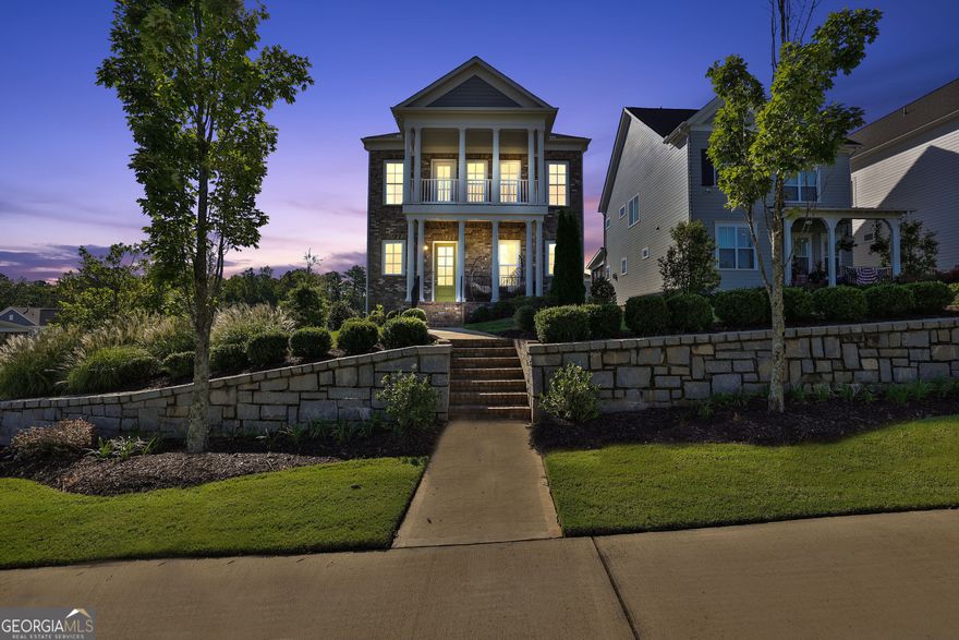 LESS THAN 1 MINUTE FROM AVALON! Welcome to 545 Hanlon Way, a charming 4-bedroom, 4-bathroom home in the heart of Alpharetta, offering an unparalleled lifestyle and prime location. This beautifully designed residence is minutes away from Avalon, with two spacious decks and a welcoming front porch, perfect for enjoying the stunning views of this vibrant area. Nestled on the most coveted lot in the community, this home offers breathtaking views of Avalon and easy access to all the amenities that make Alpharetta one of the most desirable places to live. Located just over a mile from "The Gathering," a highly anticipated $1 billion mixed-use project currently under construction, you'll be at the center of future shopping, dining, and entertainment venues. The convenience doesn't stop there-this home is also close to GA-400, Wills Park, Downtown Alpharetta, the Alpha Loop, and is situated in the highly sought-after Milton School District. Living here means you'll be at the heart of everything Alpharetta has to offer. As you step into the main level, you'll be greeted by a welcoming foyer area, leading to a guest bedroom and full bath-perfect for visitors or a home office. The terrace level offers versatile space that can be transformed into a media room, a fifth bedroom or in-law suite, and much more. The main floor features an open-concept design, seamlessly connecting the living room, kitchen, eat-in area, and dining room. Enjoy your morning coffee or evening cocktails on the back patio, which offers scenic views of Avalon and the community. Upstairs, you'll find a loft with amazing views toward Avalon, perfect for an office or playroom, along with the primary suite, which boasts a dreamy bathroom and two spacious closets. Two additional bedrooms, another full bathroom, and a convenient laundry room complete this level. With move-in ready conditions, 10-foot ceilings, and hardwood floors, this home is the perfect blend of modern luxury and convenience.