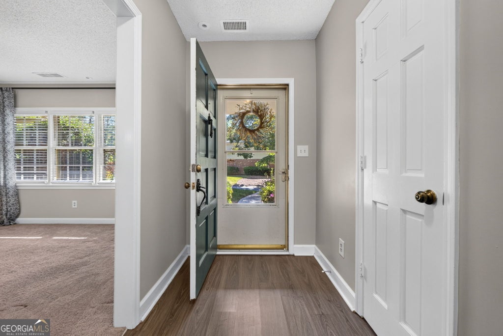 Photo of 6381 E Deerhollow Way, Peachtree Corners, GA 30092 (MLS # 10854724)