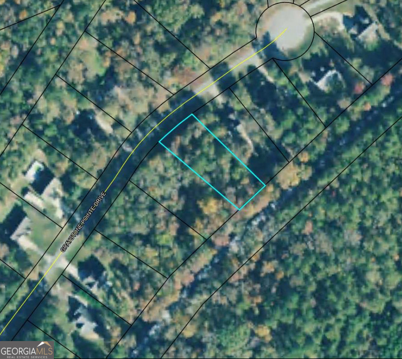 Discover your future home at 318 Graystone Pointe in Macon, GA! This exceptional 0.55-acre wooded lot offers the perfect blend of privacy and community within an established, desirable neighborhood. Imagine building your dream home nestled amongst mature trees, providing a serene escape without sacrificing convenience. Located in the thriving city of Macon, this lot offers easy access to a variety of amenities. You'll be just a short drive from downtown Macon, a vibrant hub undergoing significant revitalization. Enjoy an exciting array of dining, entertainment, and cultural experiences, from live music venues and unique shops to popular eateries like The Rookery and Fall Line Brewing Co. The downtown area also features historic landmarks such as the Hay House and the Georgia Sports Hall of Fame, alongside ongoing developments like the Mercer University School of Medicine. Explore the natural beauty of Amerson River Park or delve into history at Ocmulgee Mounds National Historical Park. Music lovers will appreciate The Allman Brothers Band Museum at The Big House and Capricorn Sound Studios, celebrating Macon's rich musical heritage. The Museum of Arts & Sciences offers a diverse range of exhibits for all ages. Don't miss this opportunity to build your custom home in Graystone Pointe, where natural beauty meets urban convenience in the heart of Macon!
