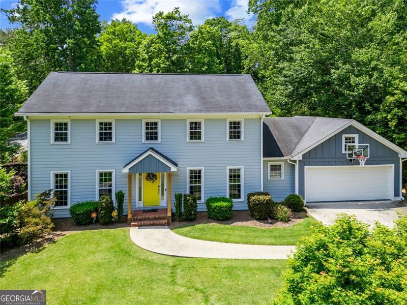 Welcome to this breathtaking two-story Colonial, perfectly nestled in the heart of Brookhaven's coveted Murphey Candler and Blackburn Park neighborhood, a community renowned for its vibrant lifestyle and natural beauty. Recently reimagined with a fully redesigned hardy plank exterior and a striking new front portico, this 4 BDRM/3.5 BA masterpiece blends timeless elegance with modern sophistication, seton a meticulously landscaped lot along a serene, tree-lined street. Step inside to gleaming hardwood floors that sweep across the main and upper levels, creating a warm and inviting flow. The expansive living room, bathed in natural light, is ideal for cozy nights or lively gatherings, while the adjacent formal dining room sets the stage for unforgettable dinners. The well-appointed kitchen features lustrous solid stone countertops, premium stainless steel appliances, and custom cabinetry. French doors open to a spacious, newly constructed screened-in porch, equipped with heaters and fans for year-round comfort, overlooking a lush, private backyard-a seamless blend of indoor-outdoor living. The inviting family room, anchored by a wood-burning fireplace with a classic stone surround, radiates comfort, with built-in shelving adding style and function. Upstairs, the primary suite offers a luxurious retreat with a spa-inspired ensuite bath. Three additional spacious bedrooms provide versatility for family, guests, or a home office, sharing a stylishly updated full bath with modern finishes. The fully finished lower level is a versatile haven, featuring a recently renovated basement perfect for a home gym, media room, or play area, complemented by a full bath and direct access to the stunning backyard. Outside, the newly landscaped front and back yards are a showstopper, with vibrant raised beds for gardening, a charming play-set for endless fun, and a stone firepit for cozy evenings under the stars. Enclosed by a sturdy privacy fence and framed by mature trees, the backyard is a private oasis for relaxation and entertaining. This home's prime location offers unparalleled access to the vibrant community life of Murphey Candler Park and Blackburn Park. Just steps away, Murphey Candler Park (135 acres) hosts a variety of events throughout the year and is home to some of the area's best youth sports programs, featuring baseball, softball, and football. Year-round, families enjoy fishing, hiking the 2-mile lake loop, and playing at the ADA-accessible playground. Meanwhile, Blackburn Park (50 acres) comes alive with the Brookhaven Cherry Blossom Festival in March, alongside the Cherry Blossom 5K, a Peachtree Road Race qualifier. The park's Nancy Creek Trail connects to Murphey Candler, perfect for year-round walking, jogging, or cycling. A short stroll from the esteemed Marist Private School and Montgomery Elementary School, this Colonial gem marries exceptional craftsmanship with an unbeatable location. With its reimagined hardy plank exterior, expansive screened-in deck, and beautifully curated outdoor spaces, this home is more than a residence-it's a gateway to an active, community-driven lifestyle. Refined, timeless, and move-in ready. Welcome to your forever sanctuary!