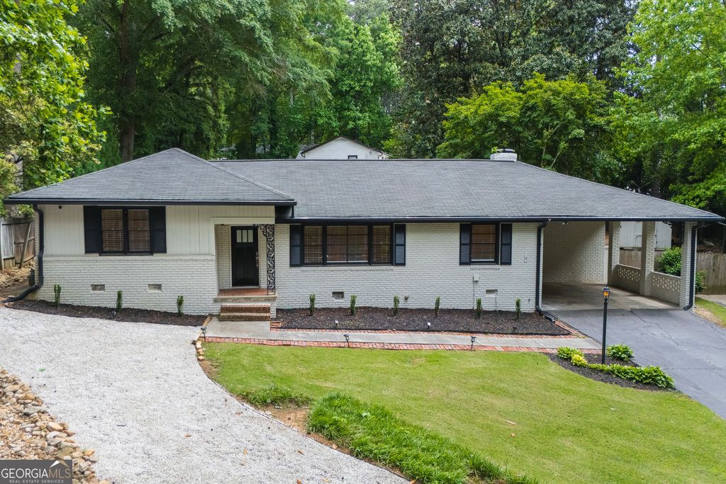 Photo of 4090 Land O Lakes Drive NE, Atlanta, GA 30342 (MLS # 10766224)