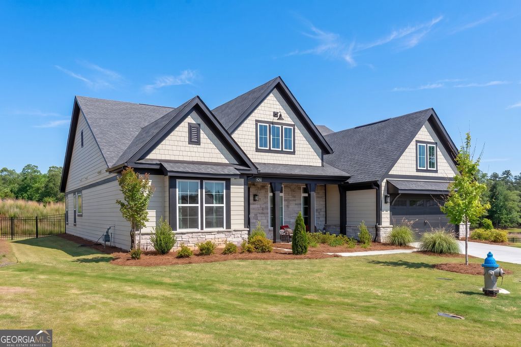 Photo of 426 Clear Lake Parkway, Hoschton, GA 30548 (MLS # 10756821)