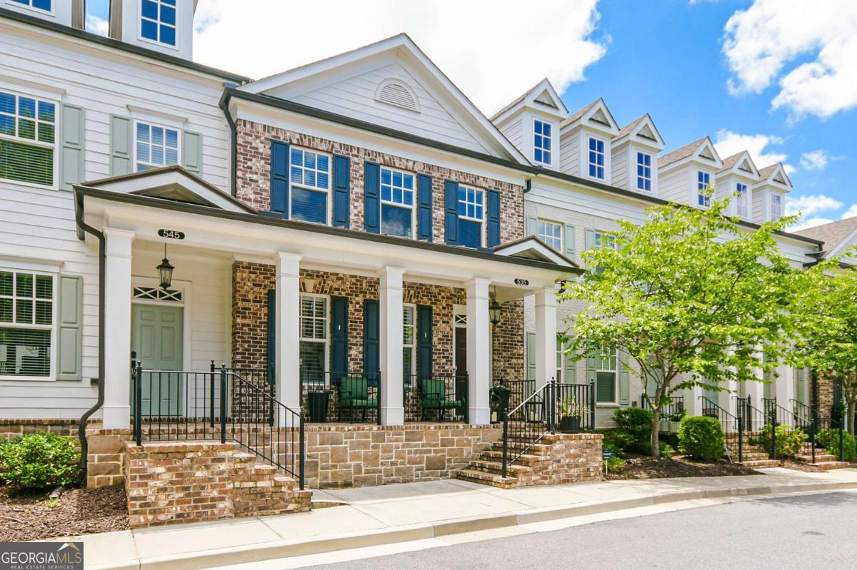 Move-In Ready 3-Bed, 3.5-Bath Townhome - Walk to Dining & Shopping in Downtown Alpharetta! This well-maintained 3-bed, 3.5-bath townhouse built in 2017 in the coveted East of Main community. Open-concept main level with fireplace, kitchen with stainless appliances and large island. Upstairs includes three bedrooms and laundry area. Attached 2-car garage and HOA-maintained grounds. Ideal location walking distance to Downtown Alpharetta dining & amenities. Rent includes HOA; tenant responsible for all utilities. Flexible lease starting August 2025.