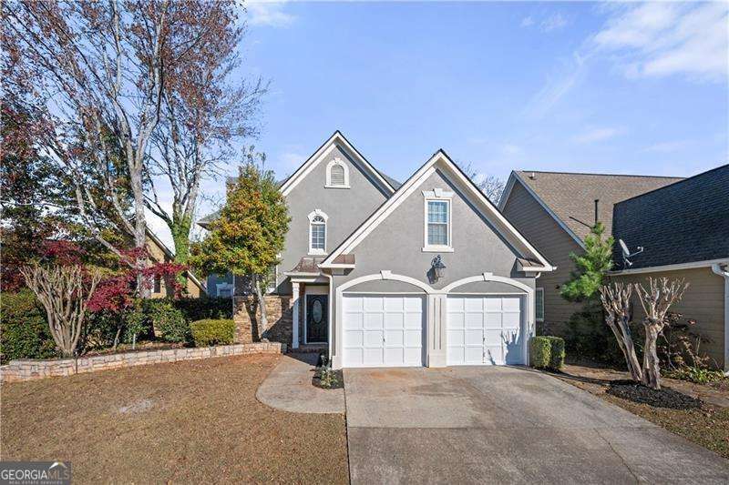 Sought after Location Only Minutes to I-75, shopping, and more! With summer just around the corner, you will enjoy the convenience of walking to the amenities in this Swim Tennis Community along with a Peaceful Pond and Sitting Area within Subdivision. Move in Ready with lots of designer upgrades! No Carpet - Luxury Vinyl Plank Flooring throughout home. Entertainer's Delight! Gourmet Kitchen featuring New Kitchen Cabinets, New Stainless Appliances, Farmhouse Sink, Intricate Crown Moulding, and Designer Lighting. Sunny Breakfast Area with Bay Window overlooking backyard. Kitchen Level Two Car Garage. Open concept Living/Dining Space with Fireplace. Elegant Dining accented by Ornate Columns and Contemporary Lighting. Updated 1/2 Bath on Main. Fresh Paint with Neutral Designer Paint Colors. Spacious Master Suite with Double Trey Ceiling joins Gorgeous Luxury Renovated Ensuite with Soaking Tub, Separate Shower, and Double Vanities. Large secondary bedrooms. Updated Full Bath Upstairs features Double Sinks. Low Maintenance Private Backyard with Outdoor Deck and Stone Patio Area. New Roof March 2023 and New Water Heater 2024! Mere minutes to Whitaker Pocket Park where you will enjoy the Walking Track, Picnic Tables, and Playground. Close by you will find Marietta Square offering Fine Dining, Farmer's Market, and Outdoor Concerts starting in April. A short drive to East Cobb Park offering Slate and Natural Trails, Field and Creek Overlooks, Picnic Areas, and more. You do not want to miss this opportunity. Schedule Your Viewing Today! $3000 LENDER CREDIT WITH PREFERRED LENDER.