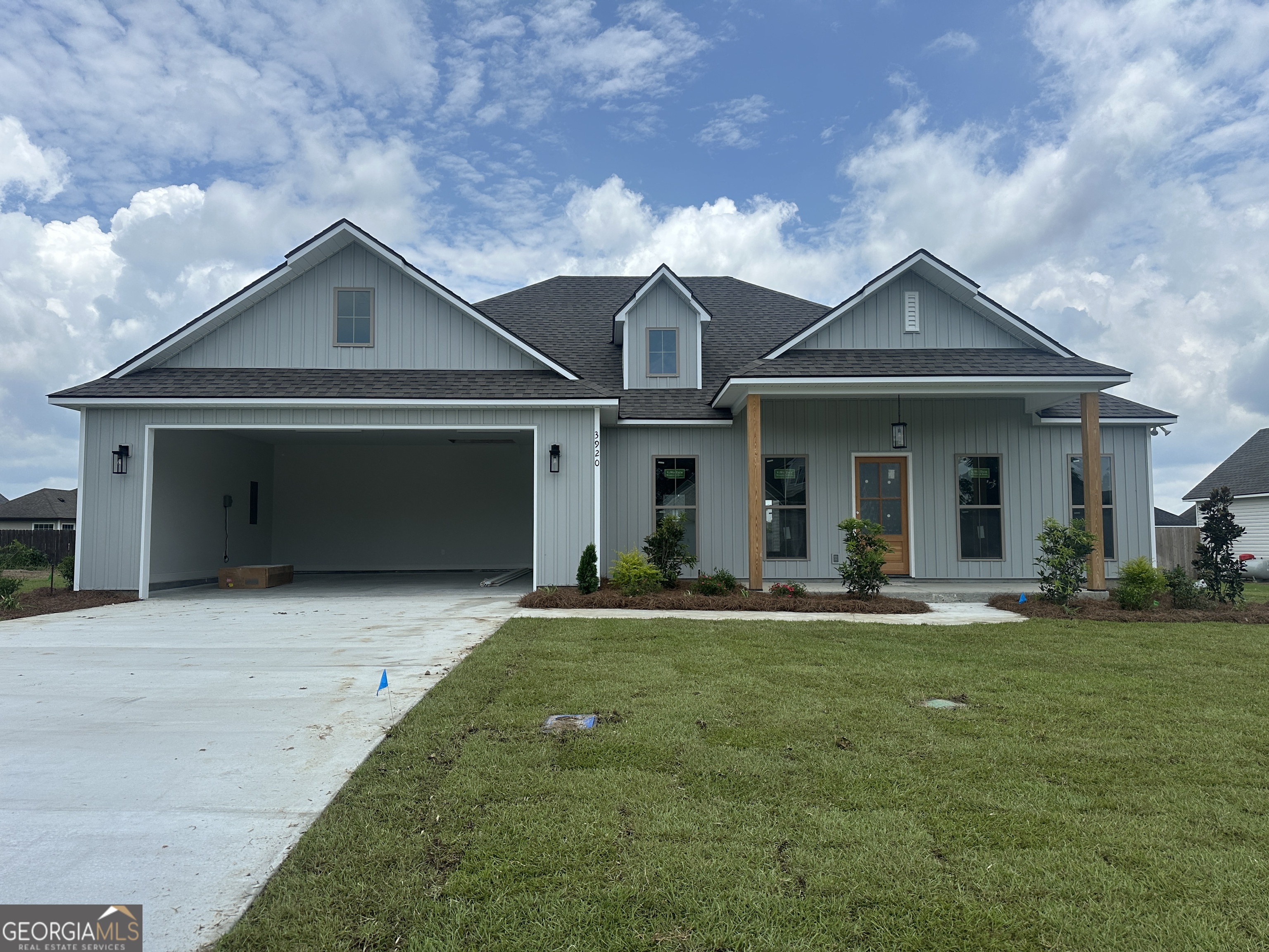 Stunning new construction in a prime location! This four-bedroom, 2 1/2 bathroom residence combines modern luxury and classic charm. As you step inside, you'll be greeted by breathtaking woodwork in the ceiling, adding a touch of elegance to the inviting open floor plan. The heart of the home is the gorgeous kitchen, a spacious island that's perfect for entertaining, along with stainless steel appliances, and a beautiful tile backsplash that enhances its contemporary feel. Laundry day becomes a joy in the uniquely tiled laundry room, designed not just for function, but for fun! Custom cabinetry throughout offers ample storage space, while the beautiful landscape outside invites you to enjoy the fresh air and your private haven. The primary suite is a true retreat, boasting a large walk-in closet for all of your storage needs, and a spa-like in-suite bathroom. Relax in the separate Tile shower or unwind in the luxurious bathtub, completed by a double vanity for ultimate convenience. With a thoughtful split floor plan, the layout ensures privacy and comfort for everyone in the household. Enjoy the outdoor space enclosed by a privacy fence, perfect for gatherings or quiet evenings under the stars. Equipped with blinds throughout, a refrigerator, and a gas tankless water heater, this home is both functional and efficient. Don't miss the chance to experience elegant living in a prime location. The listing agent is related to the builder. Two owners are licensed agents in Georgia.