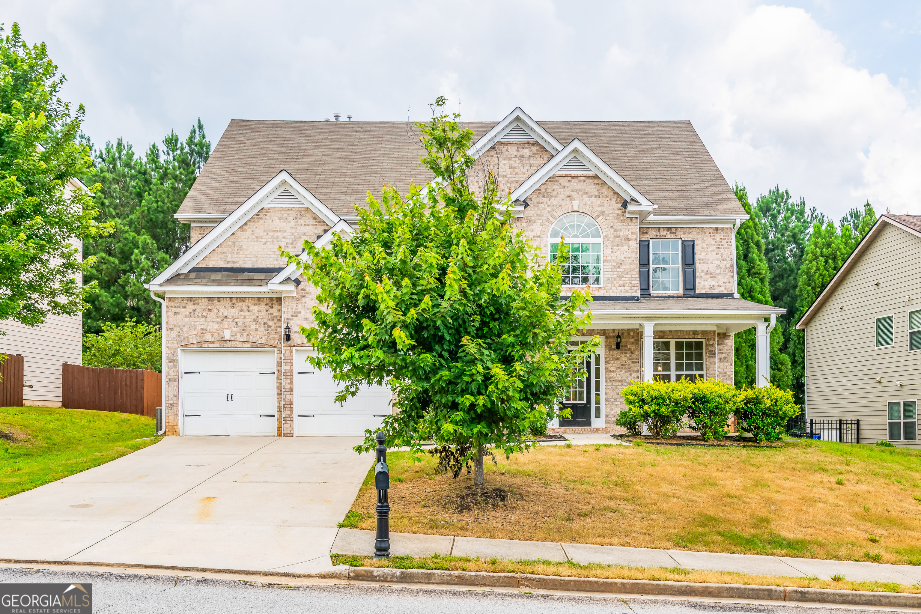 Exceptional 3-Story Home in Southwind Golf & Tennis Community! Recently renovated with brand-new stainless steel appliances, new carpet, and fresh paint throughout. Features an open-concept layout with a spacious kitchen, granite countertops, large island, and coffered-ceiling dining room perfect for entertaining. The private upstairs master suite includes dual stairwell entries, a sitting area, and a large walk-in closet. The third-floor bonus space is a showstopper ideal for a home theater and complete with a projector, plus 2 additional rooms and a full bath. Enjoy the covered back porch and beautiful backyard, ready for your personal touch. This home offers space, style, and comfort in one of the area's premier communities! Don't miss your opportunity to make it yours!