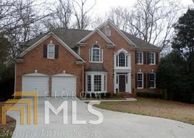 IMPECCABLY MAINTAINED TRADITIONAL HOME W/Pottery Barn Design Features throughout will Absolutely WOW YOU!! A 2-story Entrance. W/Sep. Dining & Living Room. A gorgeous 2 story light & bright Family Rm W/cust. Built-in s, Fireplace & wall of windows, Opens to a Large, Updated Kitchen W/Island, SS Appliances, & granite tops. A Sumptuous Master Suite W/trey ceiling, fireplace, walk-in closets & designer bath compl. W/ Sep. Shower & Jacuzzi tub await. The full Finished Basement. w/Full Bath & poss. 6th Bdrm, Media Room, Rec Room walks out to fenced-in yard. This home truly has it all **Location, Designer Touches, & Northview HS Dist.
