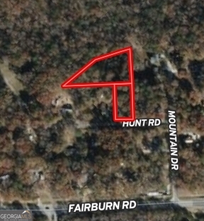 Incredible opportunity on Mountain Dr off GA & Hunt Rd in Douglasville, GA! This offering includes two joined lots totaling approximately 1.57 acres and featuring an old home that hasn't been lived in for 15-20 years, ready for your renovation or redevelopment plans. All utilities are available-public sewer, water, and electricity-making this property a prime investment with infrastructure already in place. Douglasville, steeped in rich railroad history, has evolved into a vibrant, growing suburb just 25 miles west of downtown Atlanta-a quick 30-minute drive. Residents enjoy convenient access to Atlanta's booming job market, including opportunities in tech, logistics, healthcare, and film production, while benefiting from Douglasville's lower cost of living. This area is packed with amenities for every lifestyle: explore charming local shops, parks, and family-friendly venues like the Arbor Place Mall, Sweetwater Creek State Park, and Douglas County's highly rated schools. Douglasville's emerging nightlife scene includes craft breweries, wine bars, live music venues, and a variety of restaurants from Southern classics to international cuisine. Sports and fitness enthusiasts will love being close to Foxhall Resort, West Pines Golf Club, and the many recreation centers and sports complexes nearby. And being just 30 minutes from downtown Atlanta means you're a short drive from Mercedes-Benz Stadium (home of the Falcons and Atlanta United), State Farm Arena, the Georgia Aquarium, and world-class cultural and entertainment events. Whether you envision renovating the existing structure or starting fresh, this property's location, size, utilities, and potential are hard to beat. Invest in Douglasville's bright future today-perfect for homeowners, investors, or developers looking for a property with location, convenience, and opportunity all in one.