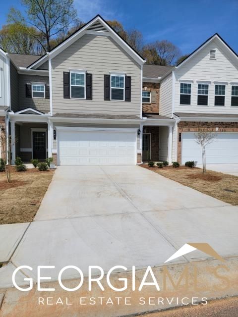 Photo of 160 Madison Bend, Holly Springs, GA 30188 (MLS # 10674189)