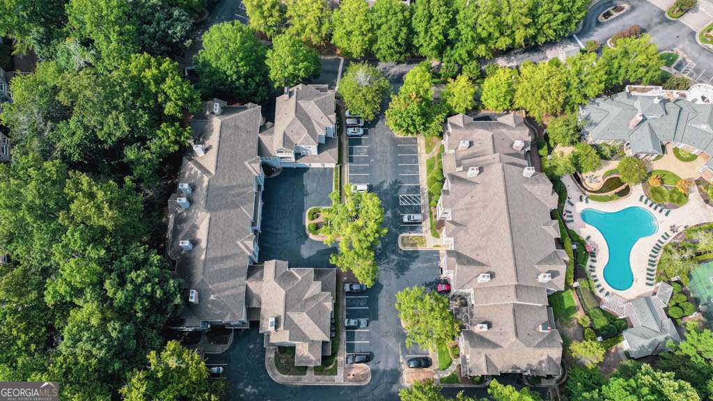 Welcome to The Villages of Devinshire-a highly sought-after gated community in the heart of Alpharetta! This beautifully maintained 2-bedroom, 2.5-bathroom condominium offers comfort, convenience, and resort-style living. The open floor plan features a bright and spacious living area, a modern kitchen with ample cabinetry, and private bedrooms perfect for relaxation. The primary suite includes a walk-in closet and en-suite bath, while the second bedroom also features its own private bath-making it ideal for family, guests, or a home office. An additional half bath off the main living area provides extra convenience for visitors. Enjoy community amenities such as a swimming pool, clubhouse, fitness center, and tennis court, plus beautifully landscaped common areas with plenty of green space. Prime Location: - Minutes to Avalon, Downtown Alpharetta, North Point Mall, and Ameris Bank Amphitheatre - Quick access to GA-400 & Windward Parkway for easy commuting - Zoned for top-rated Manning Oaks Elementary, Hopewell Middle, and Alpharetta High School