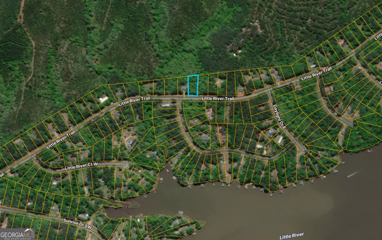 Great opportunity to own a lot just minutes from beautiful Lake Sinclair! This property is located in a quiet, established area off Little River Trail and offers the freedom of no HOA ? unlike many nearby subdivisions. Public water is available, with septic expected. The lot provides a peaceful, natural setting perfect for building your dream home, lake retreat, or investment property. With quick access to boating, fishing, and recreation at Lake Sinclair, you?ll enjoy the best of lake-area living while still being convenient to Eatonton and local amenities