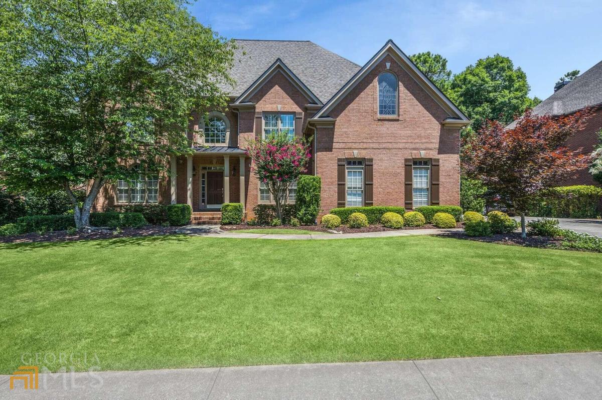 The best of Glen Abbey - completely updated and ready to move in. This stunning home is located in the highly desirable Glen Abbey swim/tennis community; close to the downtown Alpharetta shopping district and the award winning Alpharetta High School. This stunning house is situated on a nice quiet street ending in a cul-de-sac. Enter the home and you are greeted by a 2 story foyer and beautifully finished hardwood floors. Immediately you will notice the large office/den and dining room that can accommodate all your guests. The 2 story windows bathe the family room in light and feature plantation shutters. The completely updated kitchen is a chef's dream featuring an oversized island, stone countertops, updated lighting, white cabinets, stainless appliances, wine/beverage cooler, butlers pantry, and an inviting keeping room. The finished walkout basement is great for parties with an incredible bar, wine room, home theater, pool table, exercise room, and full bathroom. You will never want to leave the newly renovated master bathroom suite featuring an oversized marble/porcelain shower with rain shower head, soaking tub, brand new cabinets, his and hers closets with organizers, and and wonderful seating area to relax. The yard is professionally landscaped and features a brand new deck, covered porch, large flat grassy back yard with a fire pit, and convenient 3 car garage. You will absolutely love living in this family oriented neighborhood. There is a vibrant tennis/pickleball community, basketball courts, swimming pool, and beautiful park area next to the lake. This home will not be available for long.