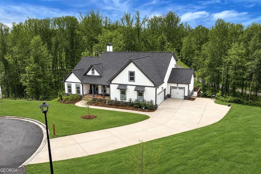 Photo of 6140 Crescent Moon Ridge, Cumming, GA 30041 (MLS # 10799277)