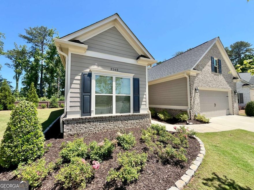 Sought-After Ranch Home in a Active Adult Community. This thoughtfully designed ranch-style home features a spacious open-concept kitchen that overlooks the family room and a generous breakfast area-perfect for casual dining. A formal dining room adds an elegant space for entertaining. The luxurious main-level master suite offers a large walk-in closet and a spa-like master bath with tile flooring, an oversized stepless shower with a built-in bench, ample counter space, and a separate makeup area. The main level also includes two additional large bedrooms and a full bathroom. Upstairs, you'll find an oversized bedroom and a full bath-ideal for guests or as a versatile bonus room. The home boasts abundant closet and storage space, including two expansive attic storage areas. Enjoy the outdoors year-round on the covered patio, perfect for relaxing or entertaining, and the charming front porch-ideal for rocking chairs. The beautifully landscaped yard is maintenance-free, with lawn care included in the HOA fees. Situated on a stunning lot in a prime location-just 3.1 miles from Smyrna Market Village and conveniently close to Marietta Square, Silver Comet Trail, The Battery Atlanta, Smyrna Community Garden, local parks, community centers, restaurants, shopping, and supermarkets. Don't miss your chance to own this exceptional home in a fantastic community!