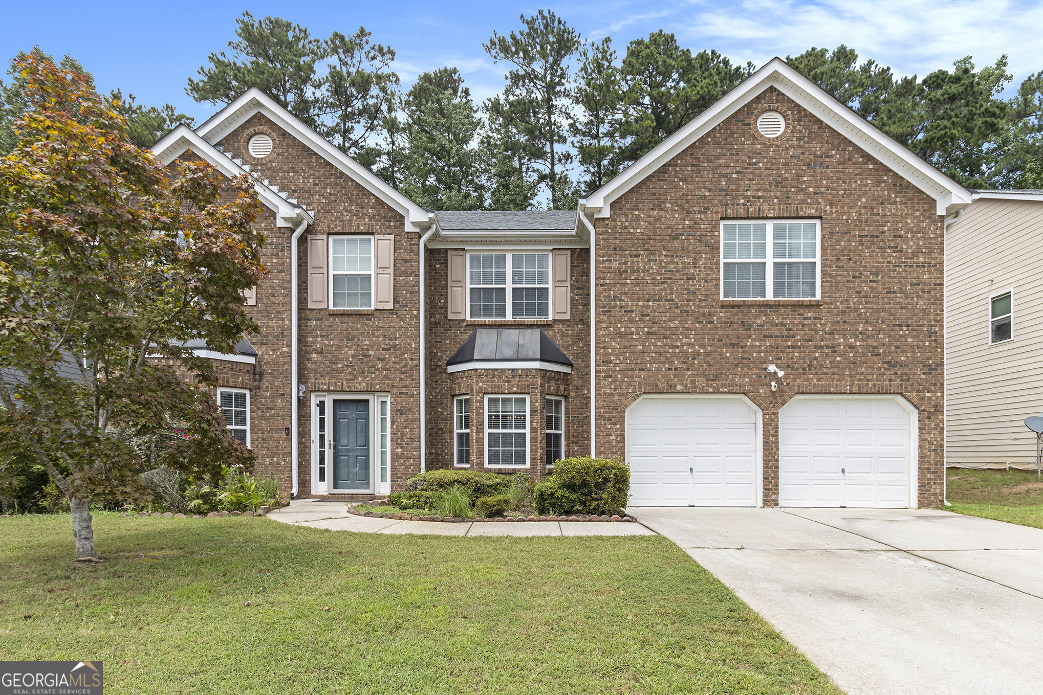 Welcome to this beautifully maintained 5-bedroom, 4-bath gem located in a PRIME Atlanta location! From the moment you step into the grand two-story foyer, you'll be impressed by the thoughtful layout and spacious design. Enjoy a separate living room and formal dining room, perfect for entertaining. The oversized family room with cozy fireplace is ideal for relaxing movie nights. The expansive eat-in kitchen offers abundant cabinet and counter space-great for cooking and gathering. A large bedroom with high ceilings and a full bath on the main level is perfect for guests, in-laws, or multigenerational living. Upstairs, a versatile loft provides the ideal space for a home office, playroom, or media area. Prepare to be wowed by the truly oversized master suite, featuring trey ceilings, a separate sitting room with a second fireplace, and a spa-like en-suite bath with double vanities, jetted soaking tub, separate shower, and a massive walk-in closet-this suite feels like a private apartment! Three additional spacious bedrooms and two more full baths upstairs ensure plenty of room for everyone. The large, flat, fenced-in backyard includes a storage building and space to play, garden, or entertain. All of this just minutes from interstates, shopping, dining, downtown Atlanta, and the airport. Don't miss your chance to own this exceptional home in one of Atlanta's most convenient and desirable locations!