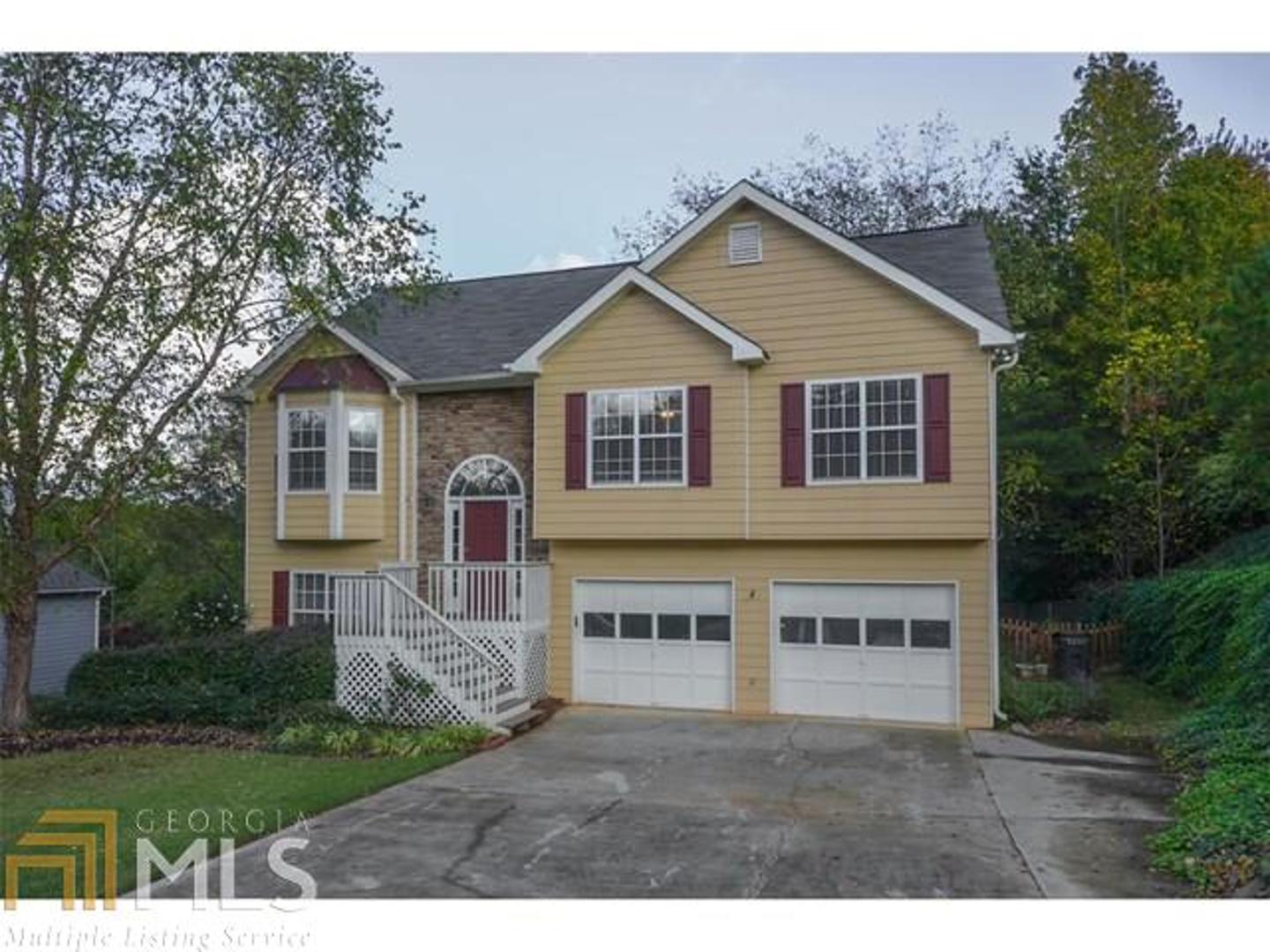Priced to sell in Sought After Area! Hardwood Flooring on Main Level with Updated Kitchen! Private, Wooded and Fenced Backyard! Large Rooms throughout! Private Bedroom with Full Bath on Lower Level plus Separate Great Room overlooking Backyard. Large Storage Room off of the Garage!