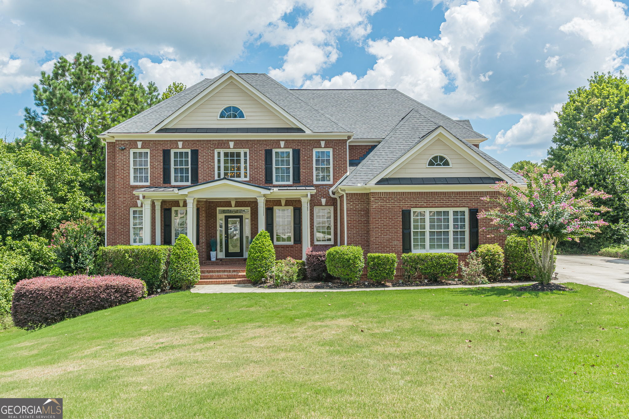 Exquisite Custom Home on Golf Course Lot in Premier Swim/Tennis Community! Beautifully maintained two-story 5200 square foot home offers elegance, comfort, and style. Stunning foyer opens main level featuring an elegant living room and formal banquet-sized dining room perfect for entertaining. The gourmet kitchen is truly a chef's dream with all new appliances, boasting an oversized island, breakfast bar, and sunny breakfast room with views of the lush backyard and beautiful pebbletec gunite pool. The luxurious owner's suite on main floor includes a spa-inspired bath for ultimate relaxation. Upstairs, you'll find generous secondary bedrooms and well-appointed baths. The finished terrace level offers even more living space, complete with two additional bedrooms, a full bath, and views of the beautifully landscaped backyard overlooking the 3rd hole on the golf course. Complete with new HVAC. Located in a sought-after community with swim/tennis amenities, and convenient to the Atlanta airport, shopping, and more this home truly has it all!