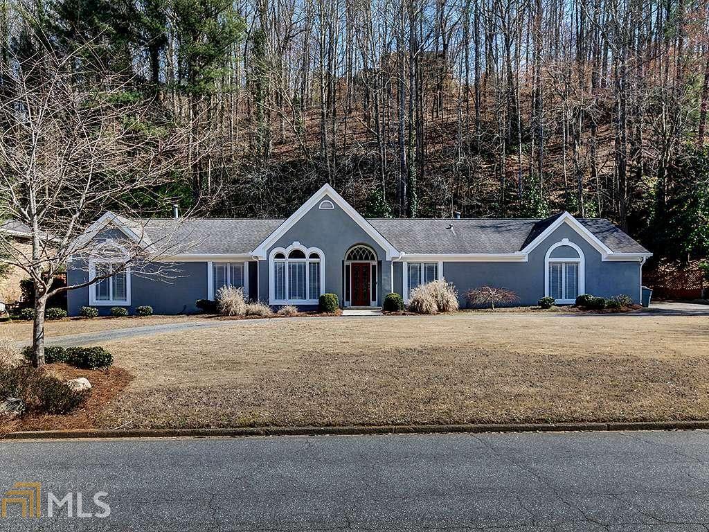 Charming, Fully Renovated 4BR/3.5BA Ranch-Style Home in Roswell's Brookfield Country Club with Private Swimming Pool on Large Half-Acre Lot! You'll Love the Updated Features Throughout Including Chef's Kitchen with SS Appliances, Beautiful Granite, Glass Tile Backsplash, Contemporary Tile Flooring and Lots of Cabinet Space. Beautifully Bright Family Room Offers Hardwoods and Stone Fireplace Only Steps to Your Backyard Oasis with Gated Courtyard and Private Pool.Close to Historic Downtown Roswell, Restaurants and Parks and Boutique Shopping in One of the Metro's Highest Rated School Districts. Community Golf, Tennis and More. Country Club Living at it's Finest!